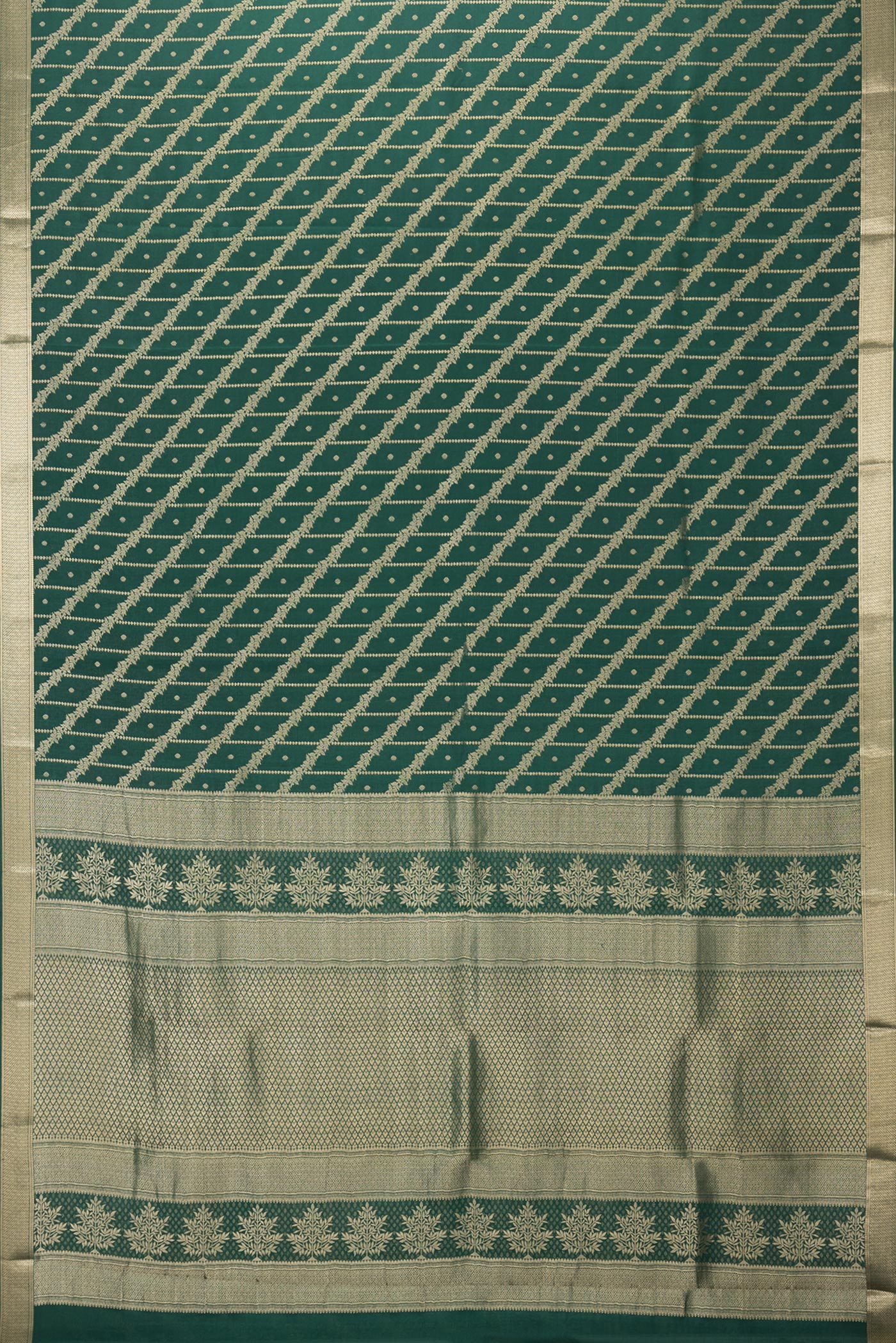 Flat view of Bottle Green Crepe Saree with Zari Brocade on the body and Zari Border. 
