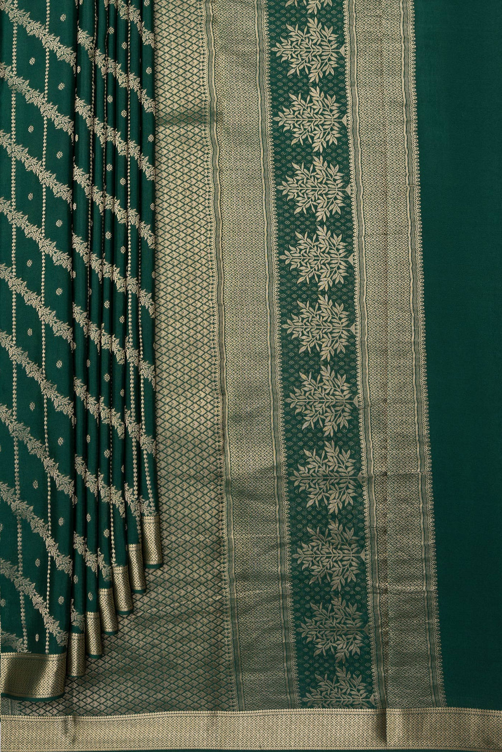 Pleats and pallu of Bottle Green Crepe Saree with Zari Brocade on the body and Zari Border. 