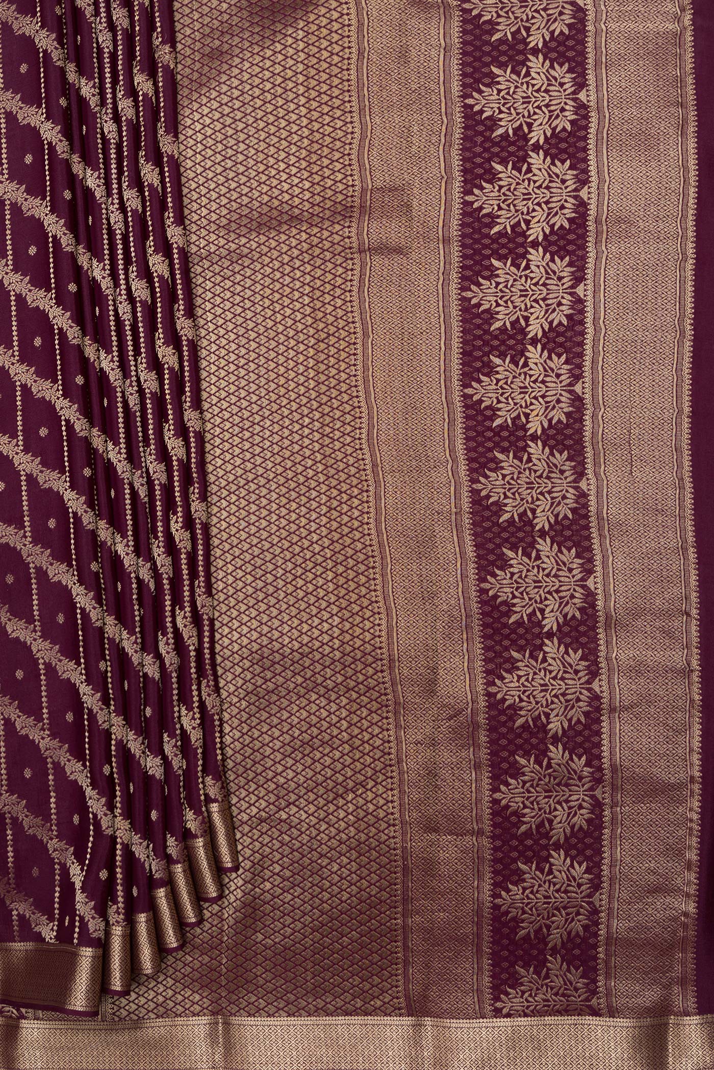 Pleats and pallu of Burgundy Mysore Silk Saree with Zari Brocade on the body and Zari Border. 