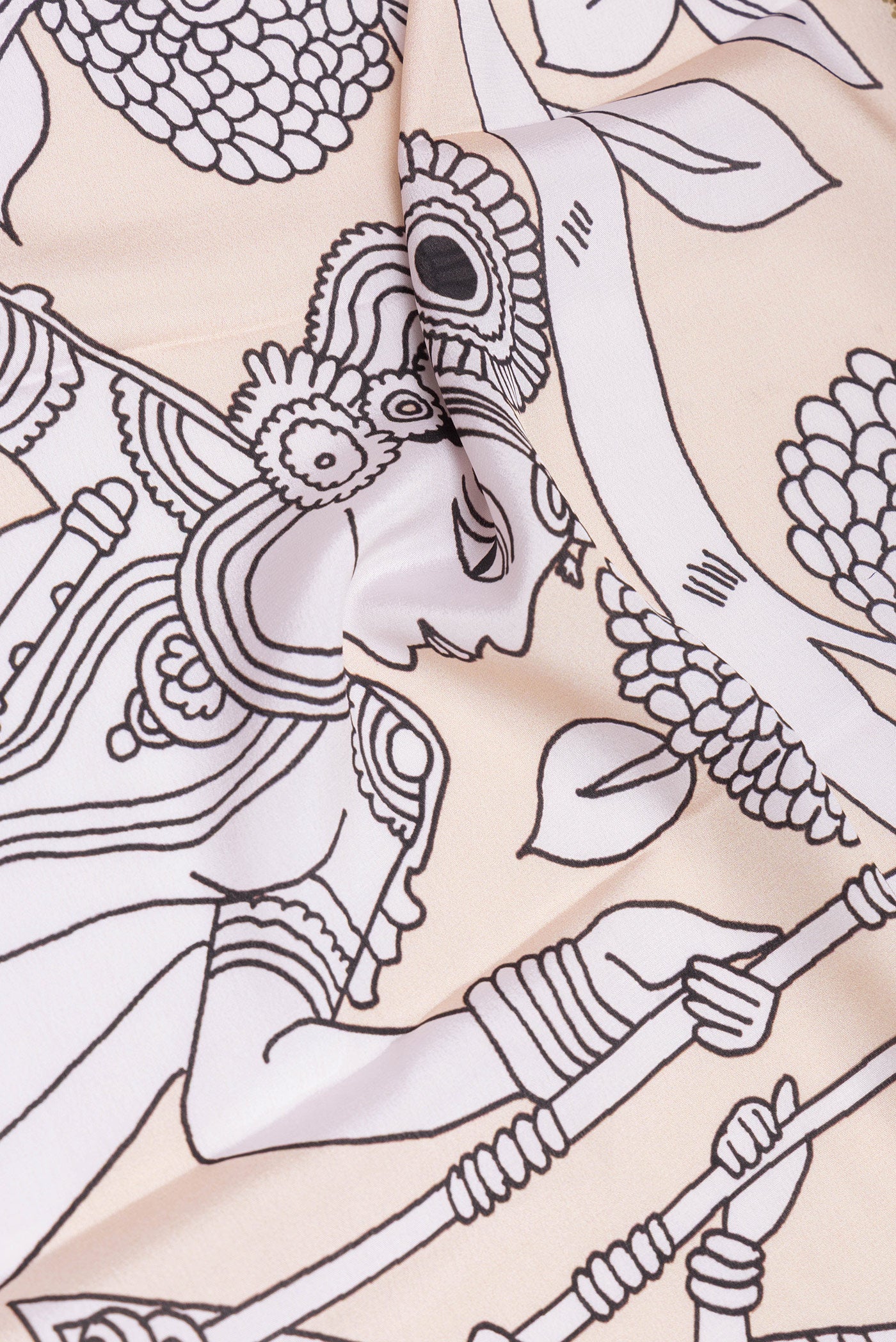 Close up of Sandal Mysore Silk Saree with Printed design on the body and Fancy Border.  displaying folds