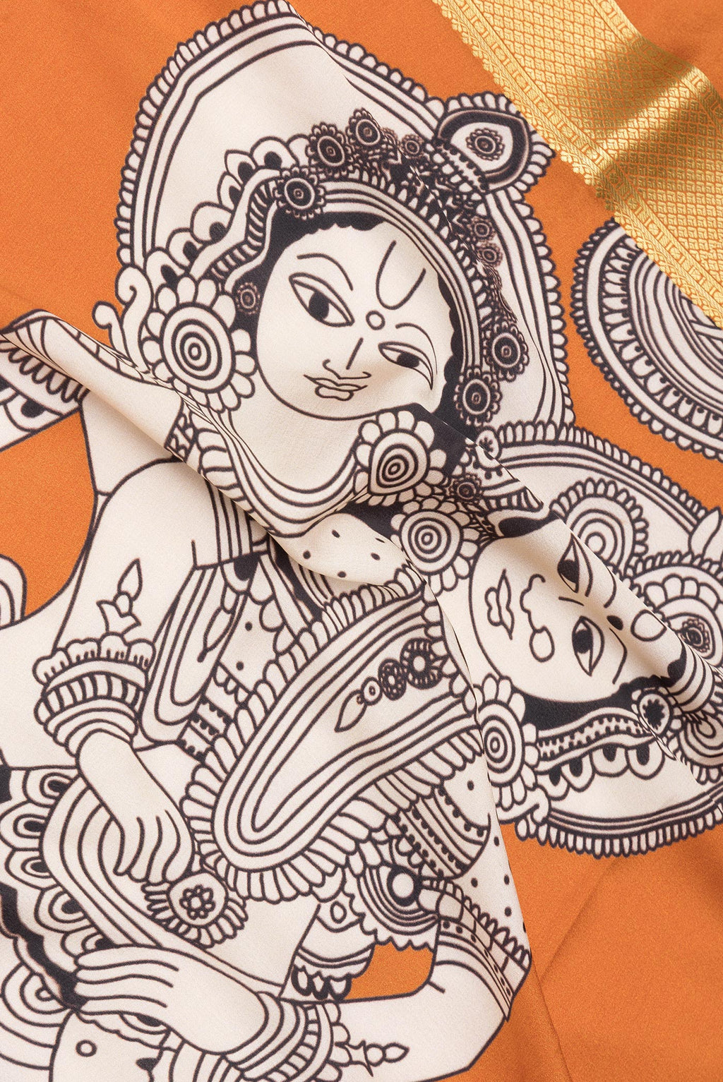 Close up of Multi Color Mysore Silk Saree with Printed design on the body and Fancy Border.  displaying folds