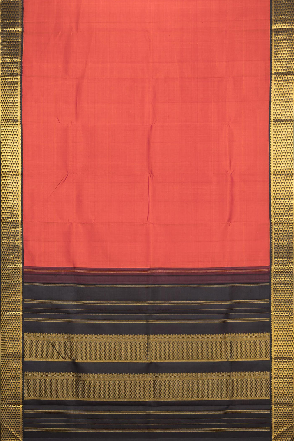 Flat view of Pure Silk Orange Dual Tone Kanjivaram Saree with Plain Body and Zari Border. 
