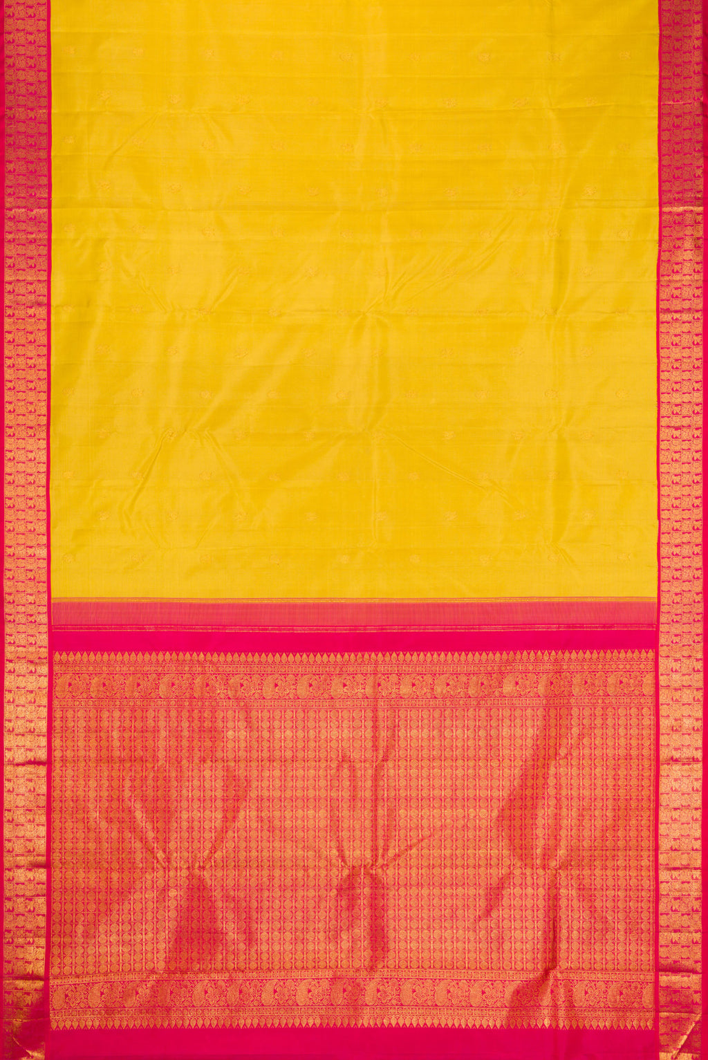 Flat view of Yellow Kanjivaram Silk Saree with Zari Butta on the body and Zari Border. 