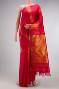 Maroon Kanjivaram Silk Saree with Zari Butta on the body and Without Border.  displayed on a mannequin