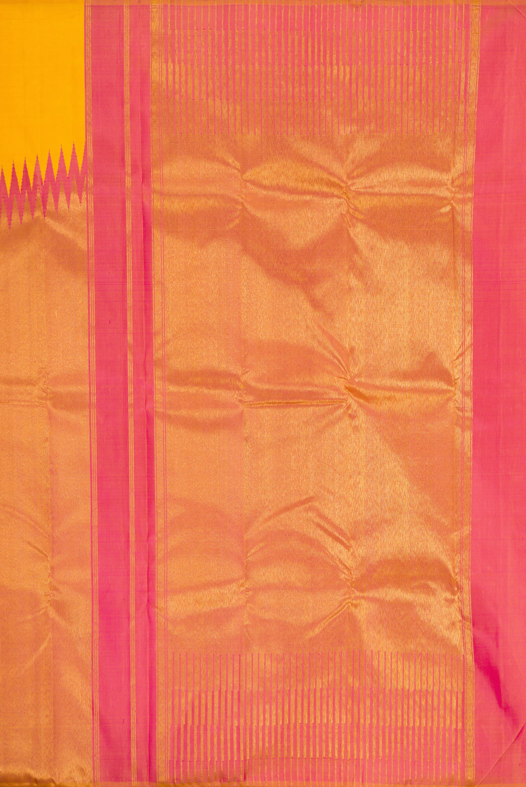 Close up image of the pallu of Yellow Kanjivaram Silk Saree with Plain Body and Rising Temple Border. 