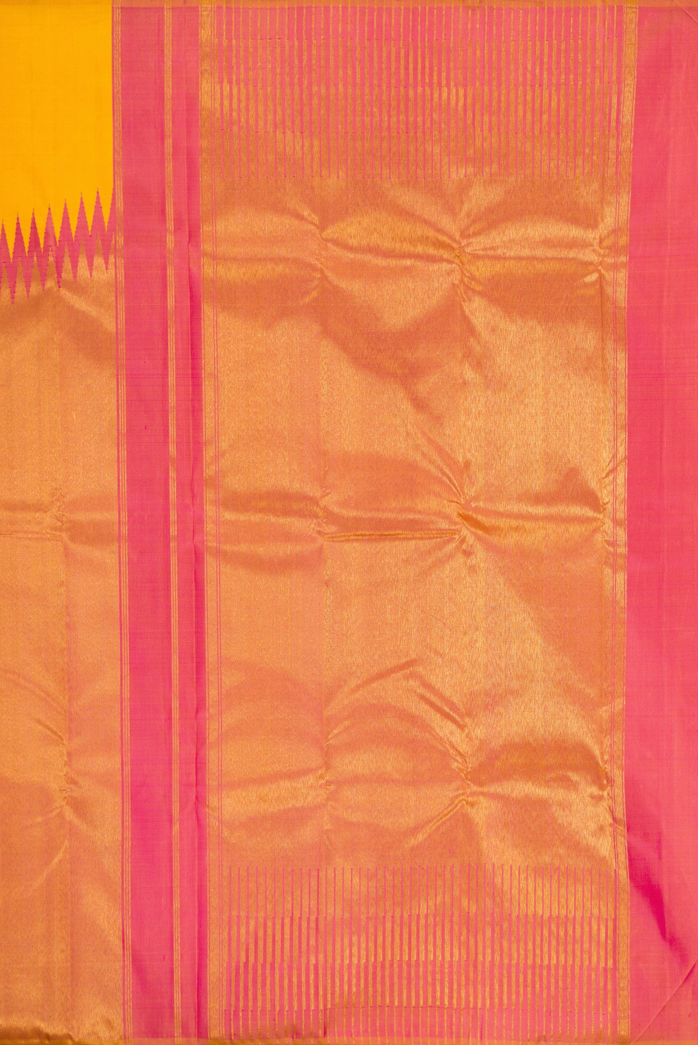 Close up image of the pallu of Yellow Kanjivaram Silk Saree with Plain Body and Rising Temple Border. 