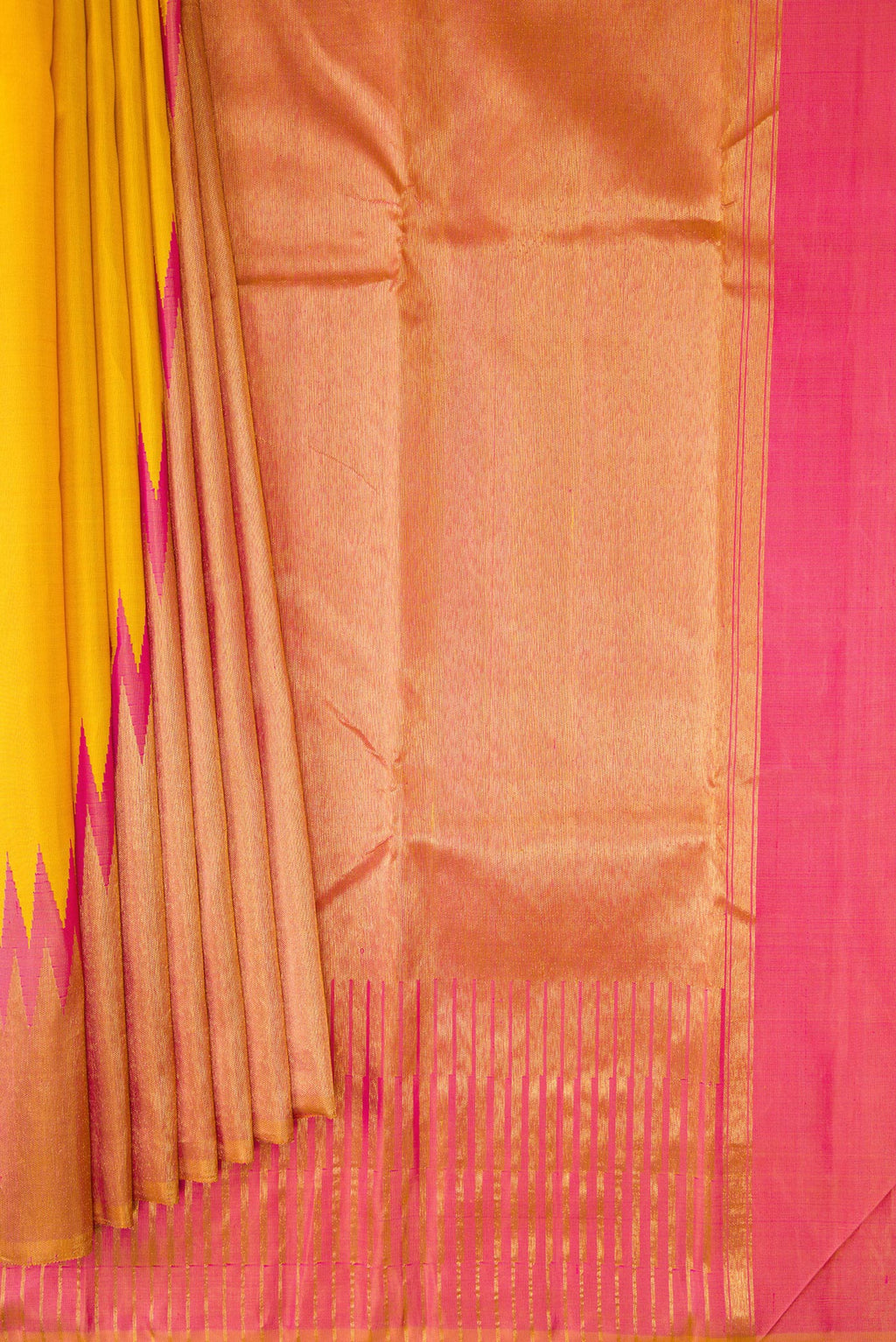 Pleats and pallu of Yellow Kanjivaram Silk Saree with Plain Body and Rising Temple Border. 