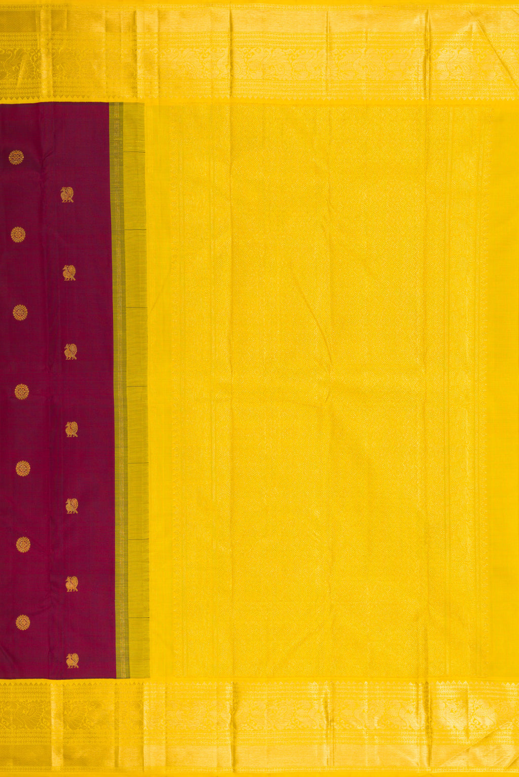 Close up image of the pallu of Maroon Kanjivaram Silk Saree with Zari Butta on the body and Zari Border. 