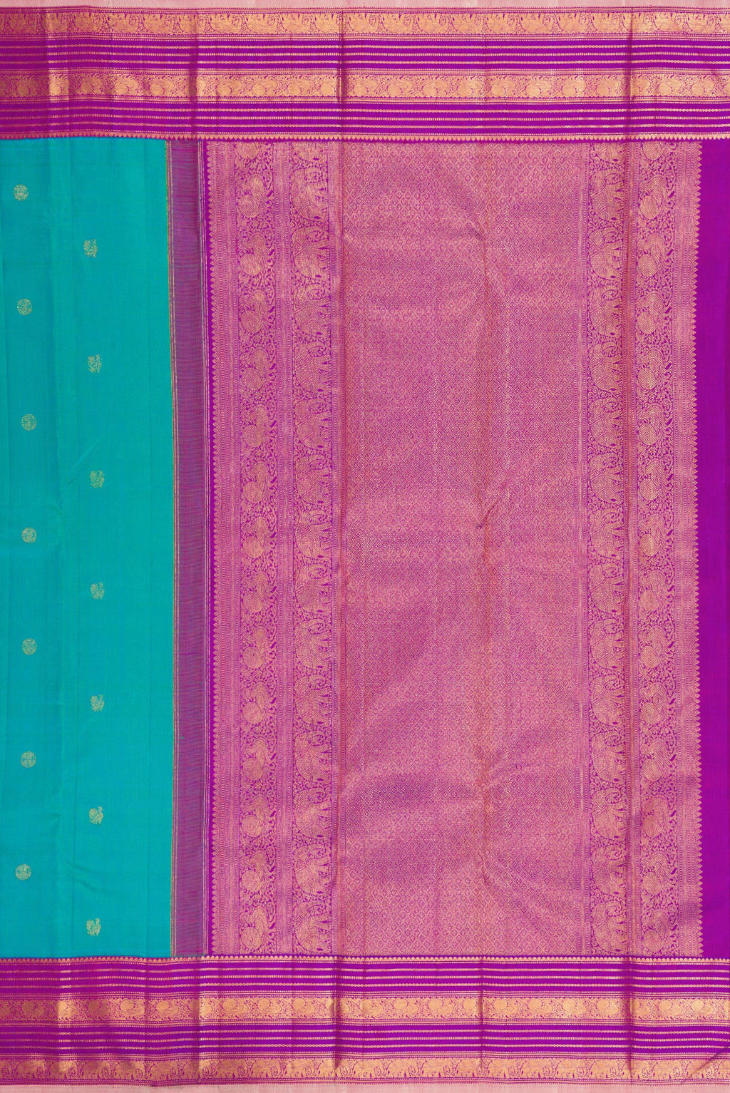 Close up image of the pallu of Blue Kanjivaram Silk Saree with Zari Butta on the body and Zari Border. 