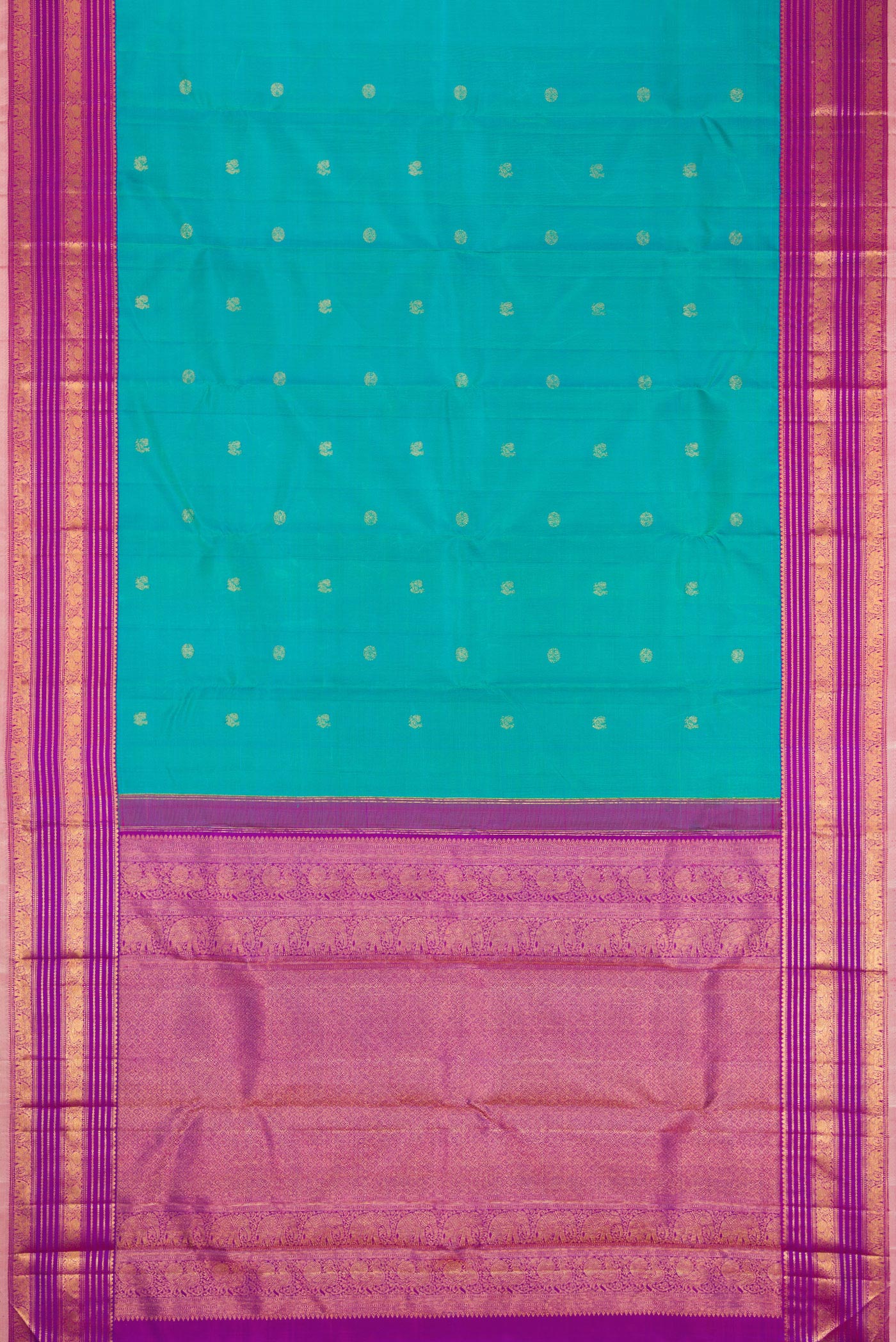 Flat view of Blue Kanjivaram Silk Saree with Zari Butta on the body and Zari Border. 
