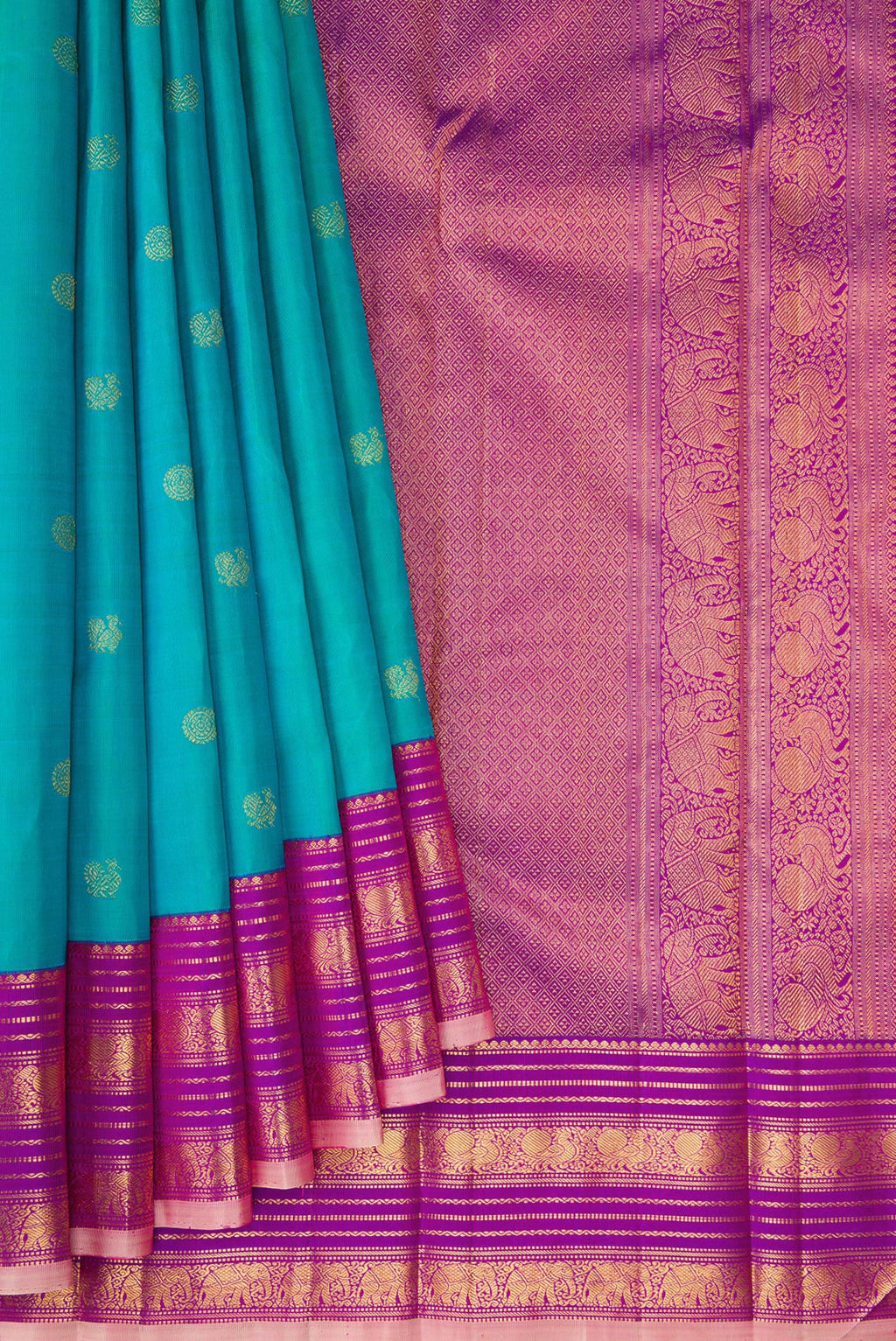 Pleats and pallu of Blue Kanjivaram Silk Saree with Zari Butta on the body and Zari Border. 