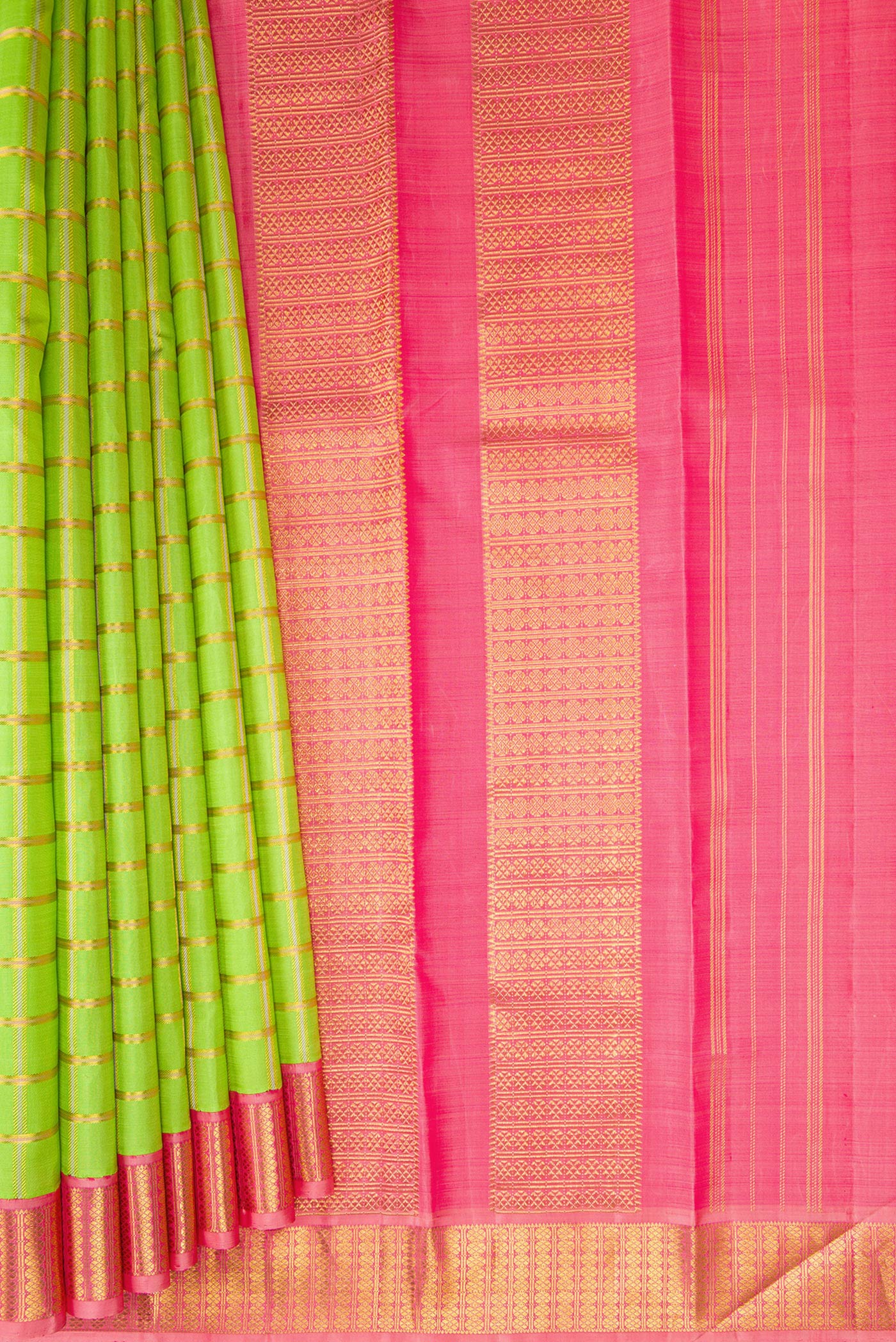 Pleats and pallu of Parrot Green Kanchipuram Silk Saree with Checked design on the body and Zari Border. 