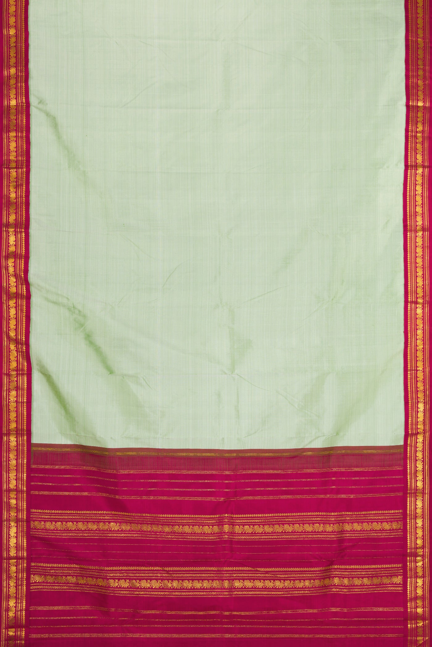 Flat view of Pista Green Kanchipuram Silk Saree with Plain Body and Zari Border. 