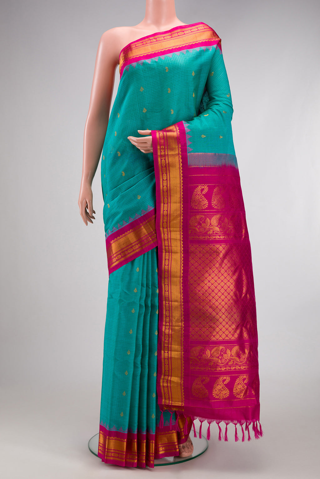 Sky Blue Gadwal Silk Cotton Saree with Checked design on the body and Zari Border.  displayed on a mannequin