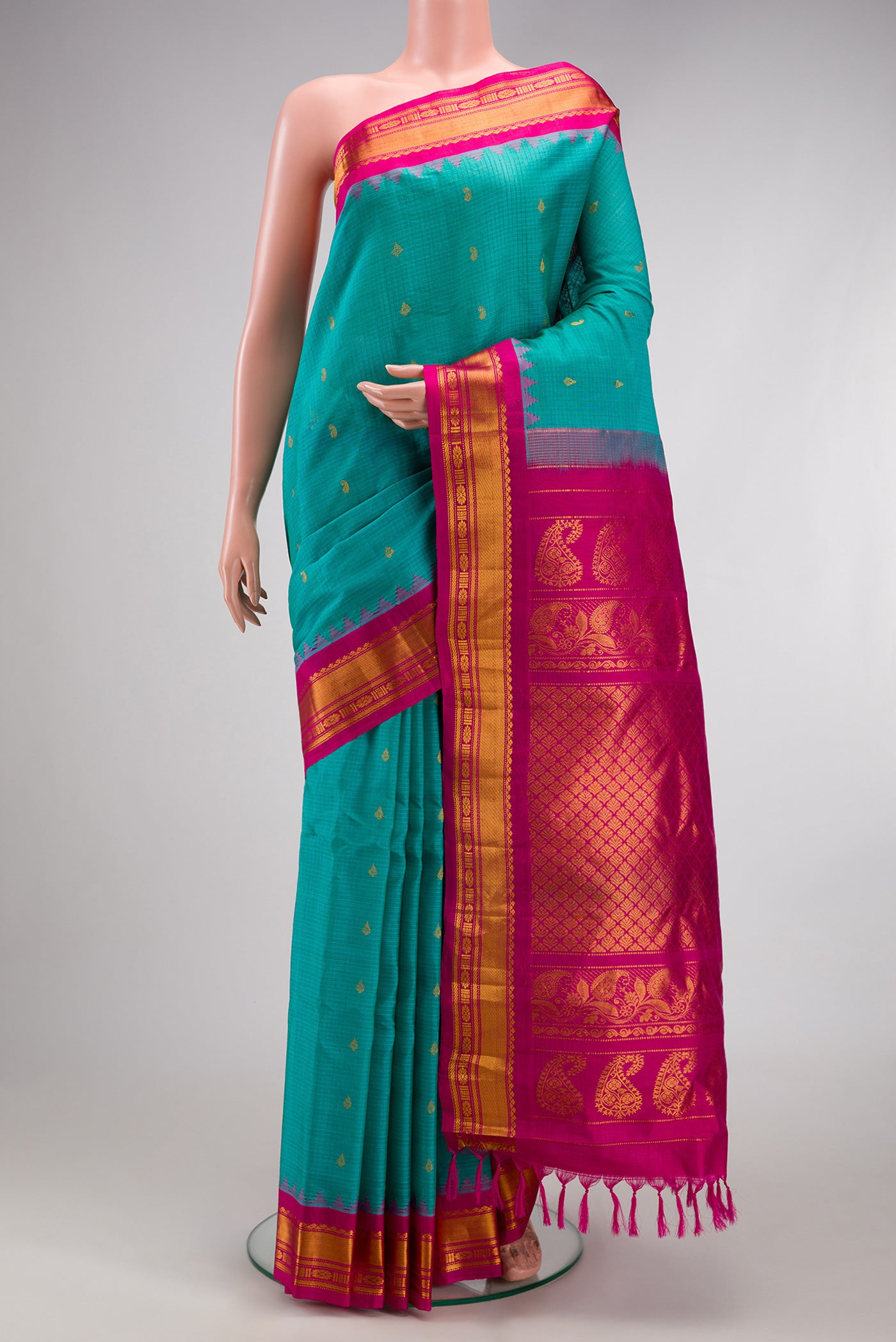 Sky Blue Gadwal Silk Cotton Saree with Checked design on the body and Zari Border.  displayed on a mannequin