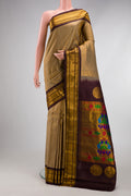 Dark Beige Gadwal Silk Saree with Zari Brocade on the body and Zari Border.  displayed on a mannequin
