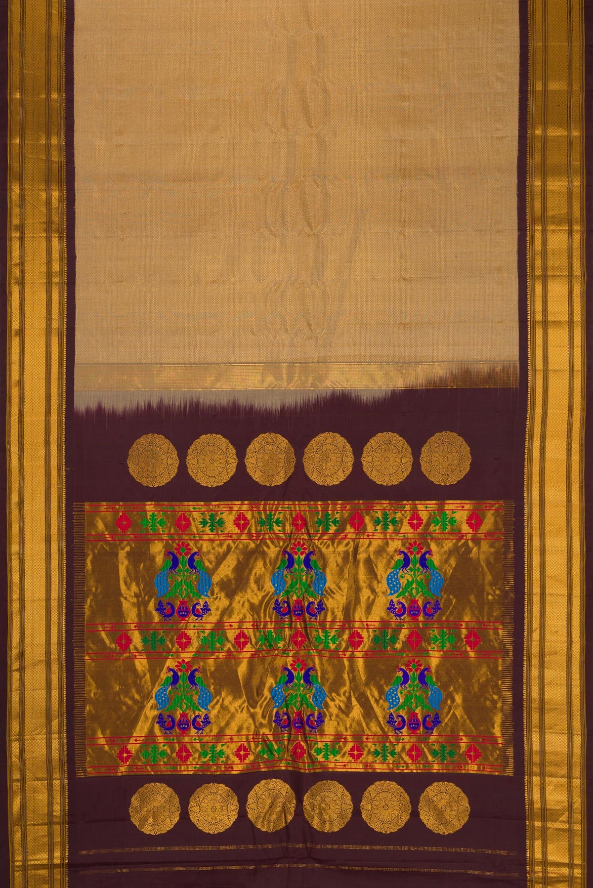 Flat view of Dark Beige Gadwal Silk Saree with Zari Brocade on the body and Zari Border. 