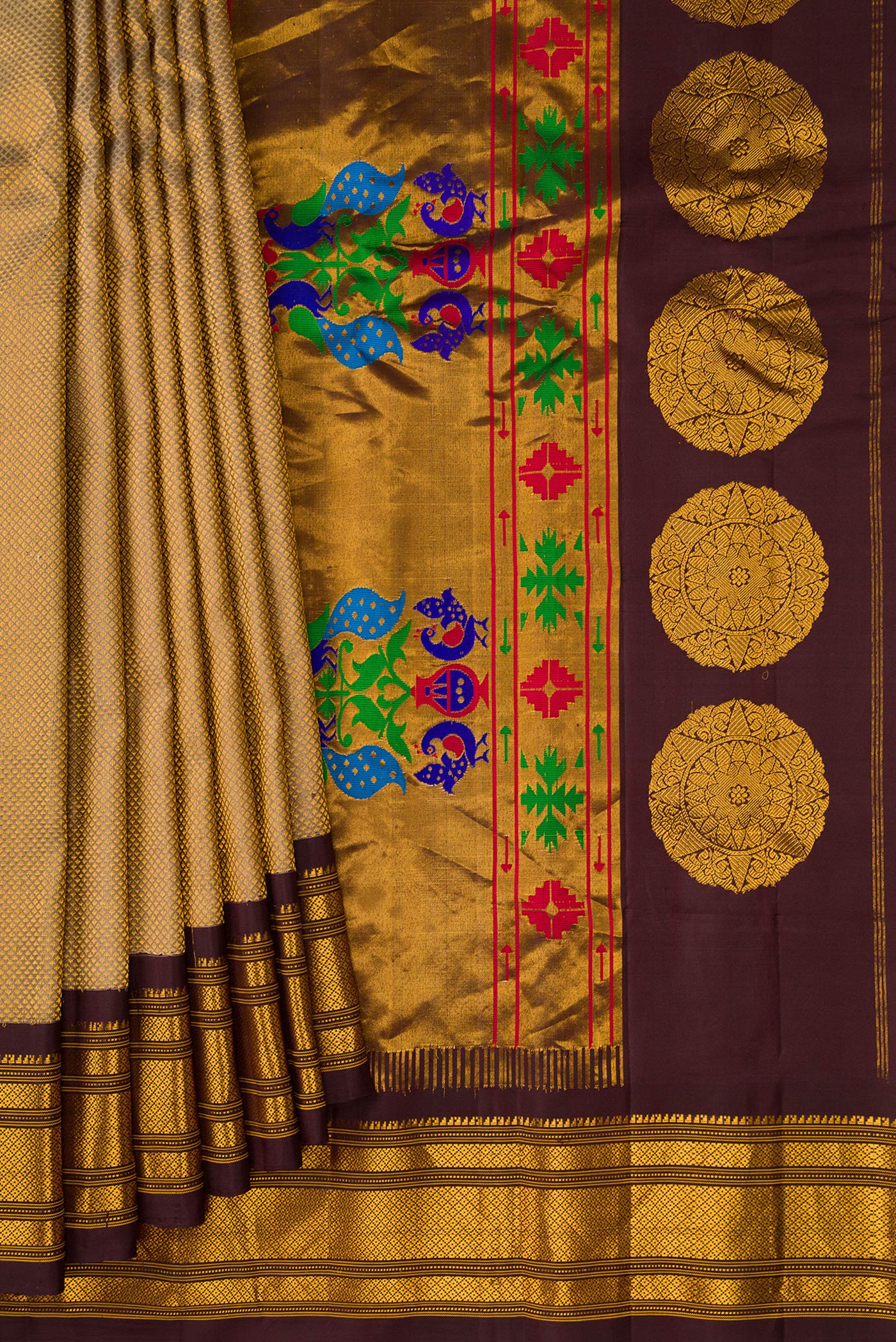 Pleats and pallu of Dark Beige Gadwal Silk Saree with Zari Brocade on the body and Zari Border. 