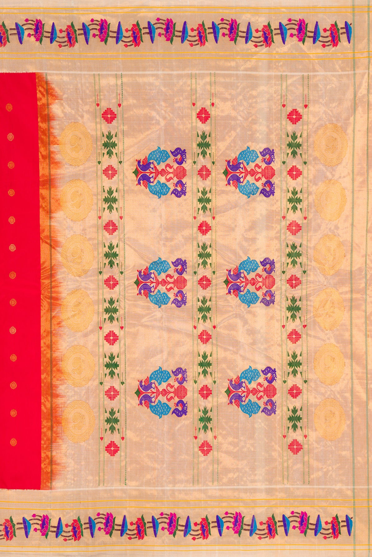Close up image of the pallu of Red Gadwal Silk Saree with Zari Butta on the body and Paithani Border. 