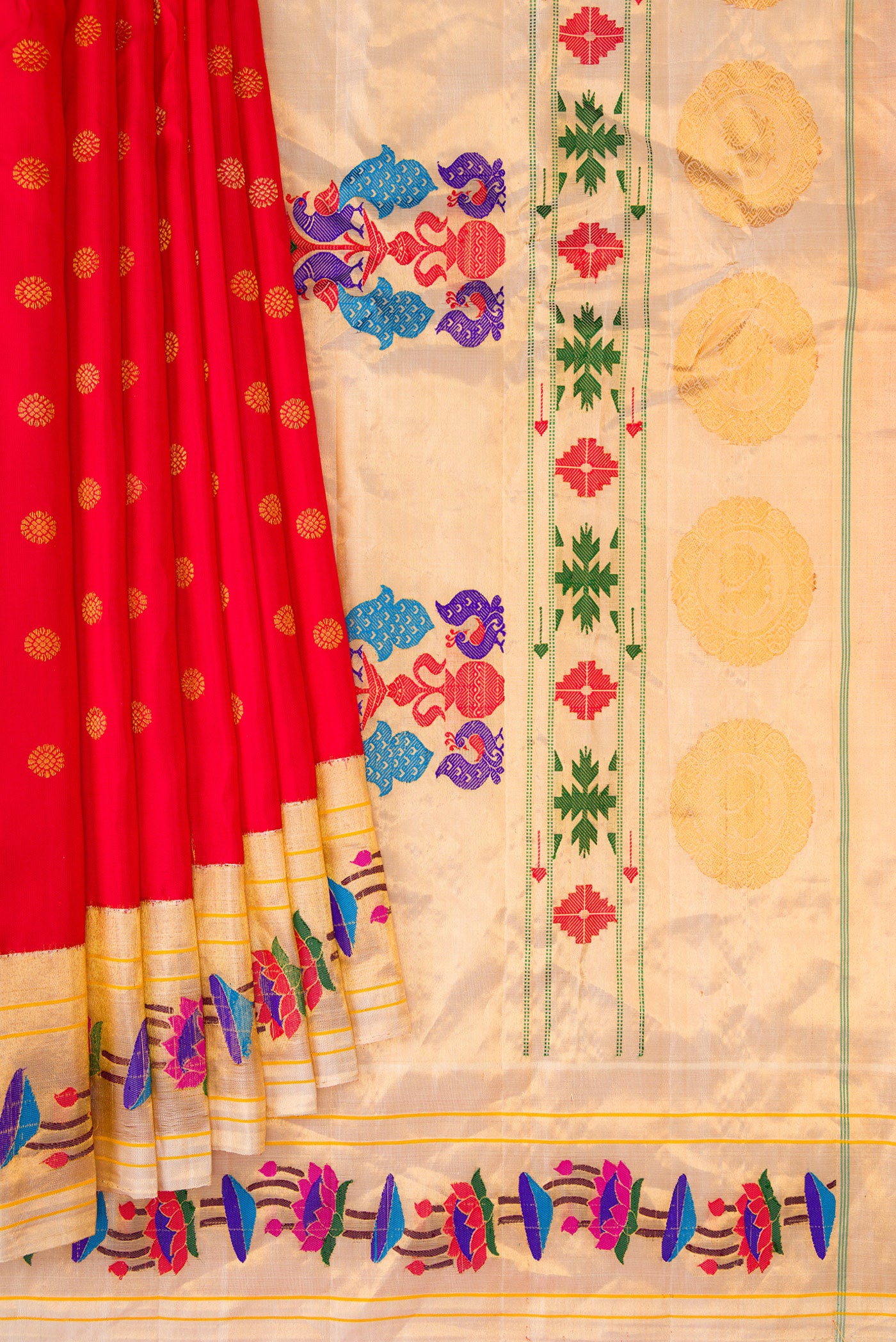 Pleats and pallu of Red Gadwal Silk Saree with Zari Butta on the body and Paithani Border. 