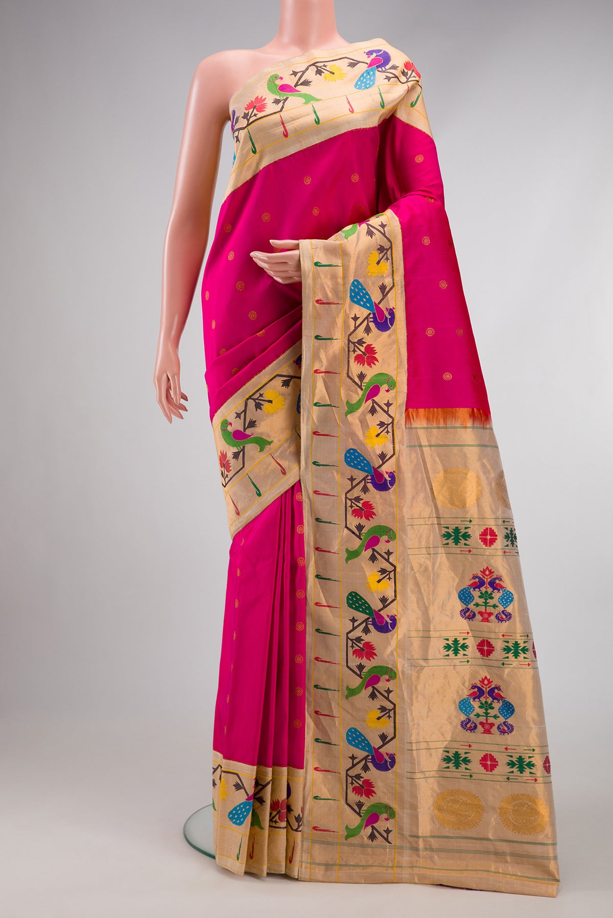 Pink Gadwal Silk Saree with Zari Butta on the body and Paithani Border.  displayed on a mannequin
