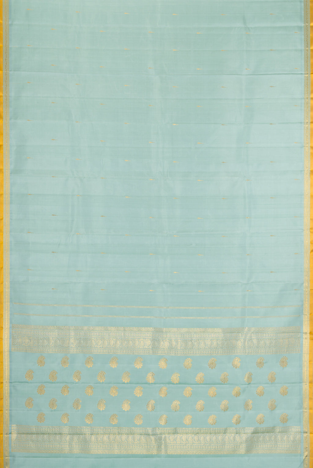 Flat view of Light Blue Kanjivaram Silk Saree with Zari Butta on the body and Zari Border. 