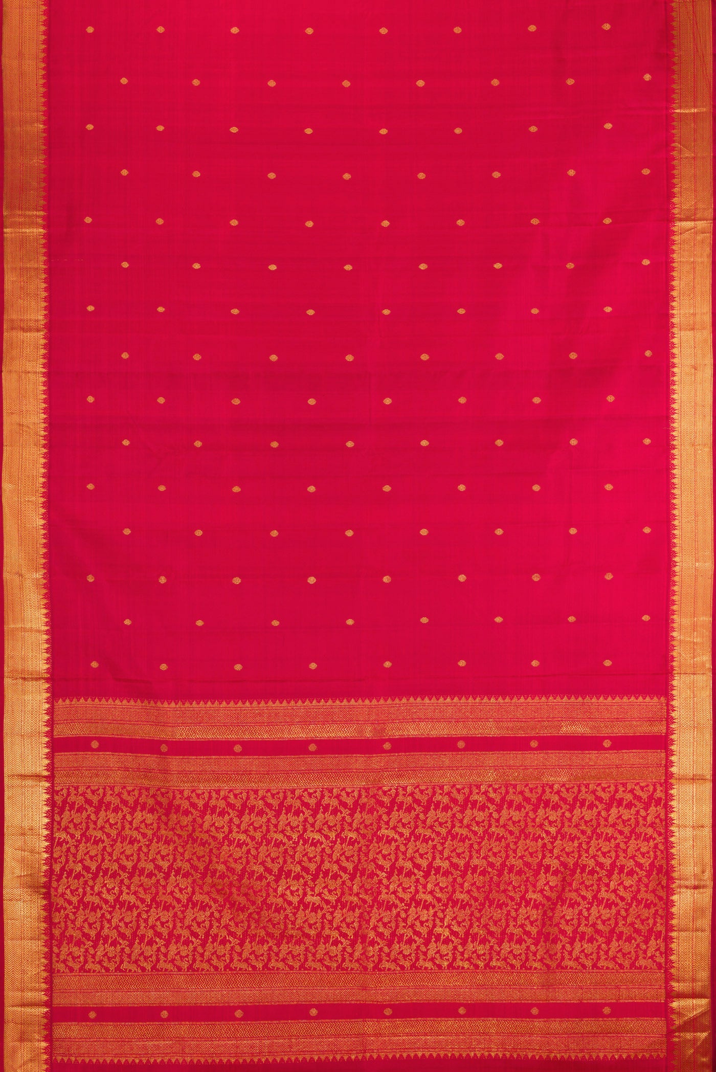 Flat view of Maroon Kanjivaram Silk Saree with Zari Butta on the body and Zari Border. 