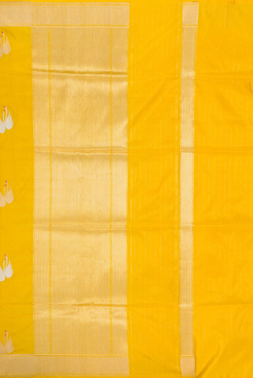 Close up image of the pallu of Yellow Dual Tone Banarasi Silk Saree with Zari And Thread Butta on the body and Zari Border. 