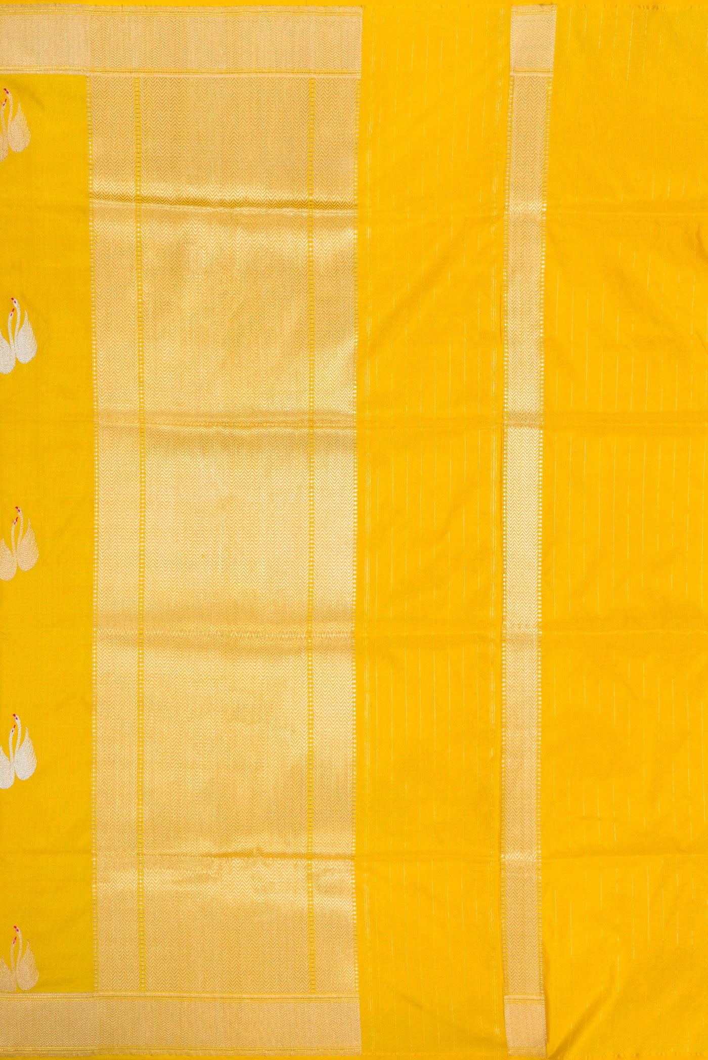 Close up image of the pallu of Yellow Dual Tone Banarasi Silk Saree with Zari And Thread Butta on the body and Zari Border. 