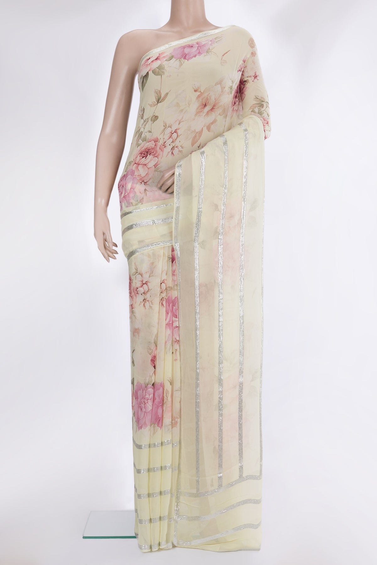 Beige Mysore Georgette Saree with Floral Print on the body and Sequin Border.  displayed on a mannequin