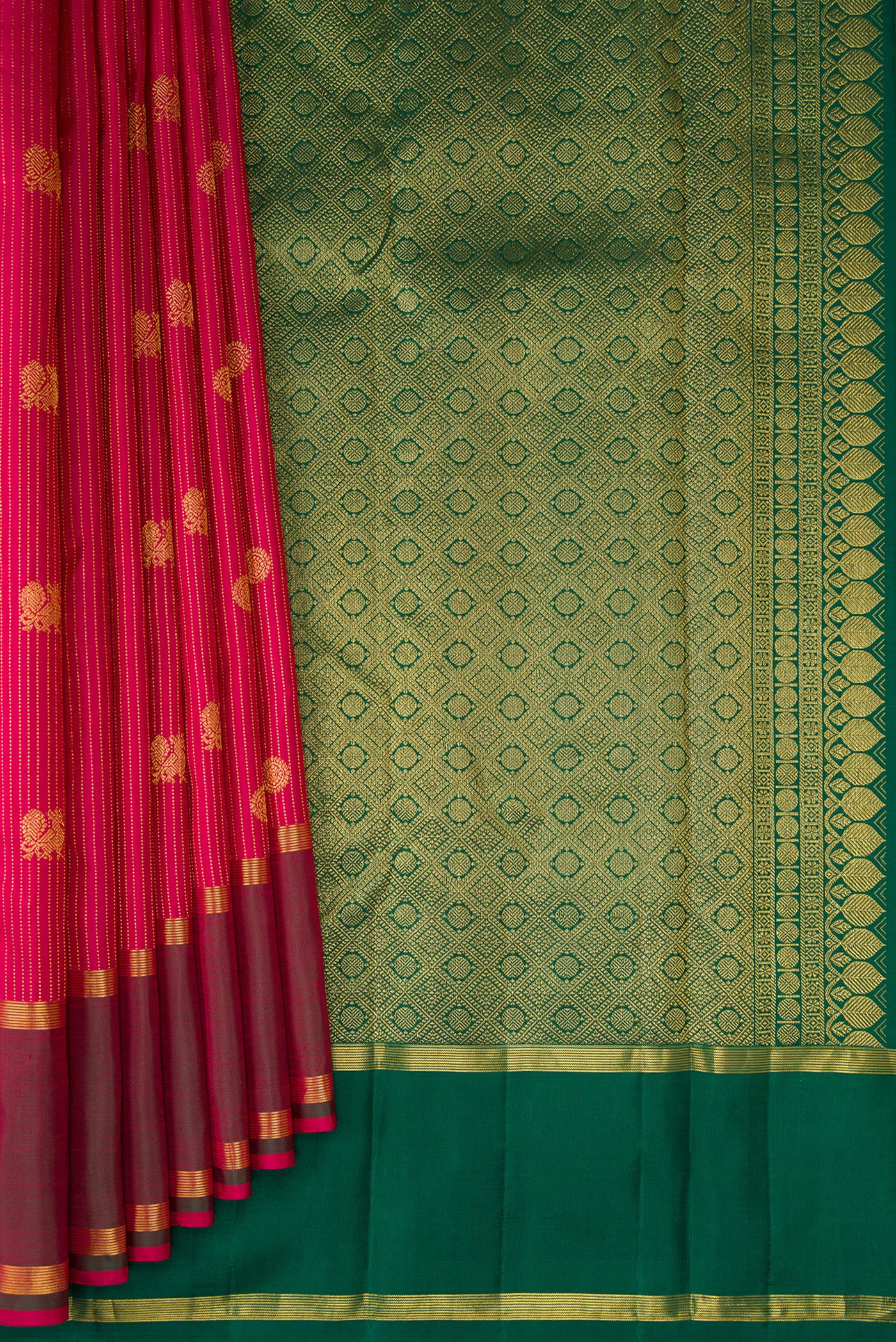 Pleats and pallu of Maroon Kanchipuram Silk Saree with Stripes on the body and Zari Border. 