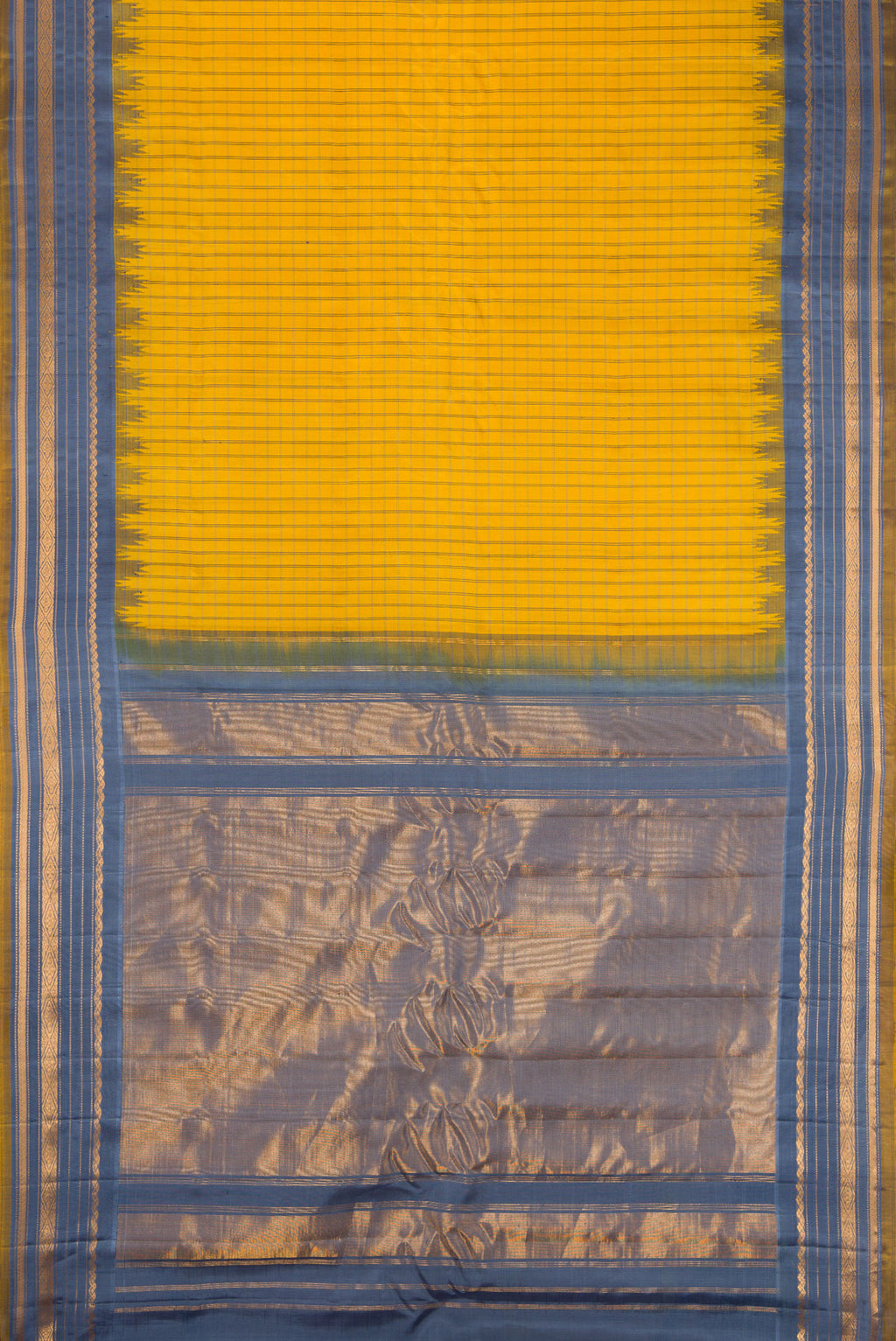 Flat view of Yellow Gadwal Silk Saree with Checked design on the body and Temple Border. 