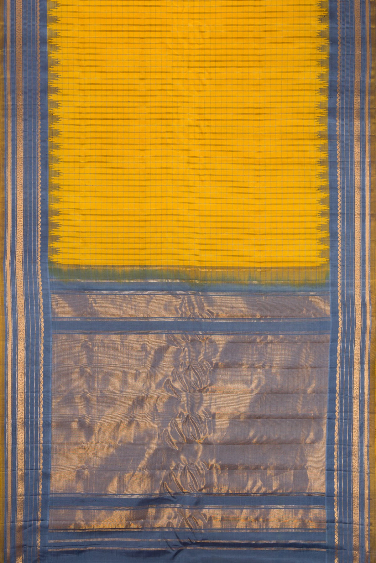 Flat view of Yellow Gadwal Silk Saree with Checked design on the body and Temple Border. 