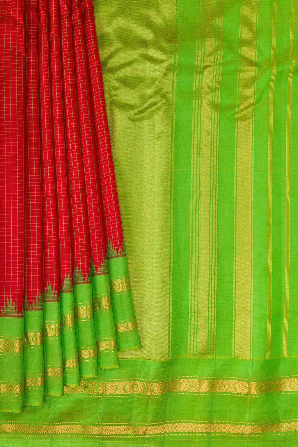 Pleats and pallu of Maroon Gadwal Silk Saree with Checked design on the body and Zari Border. 