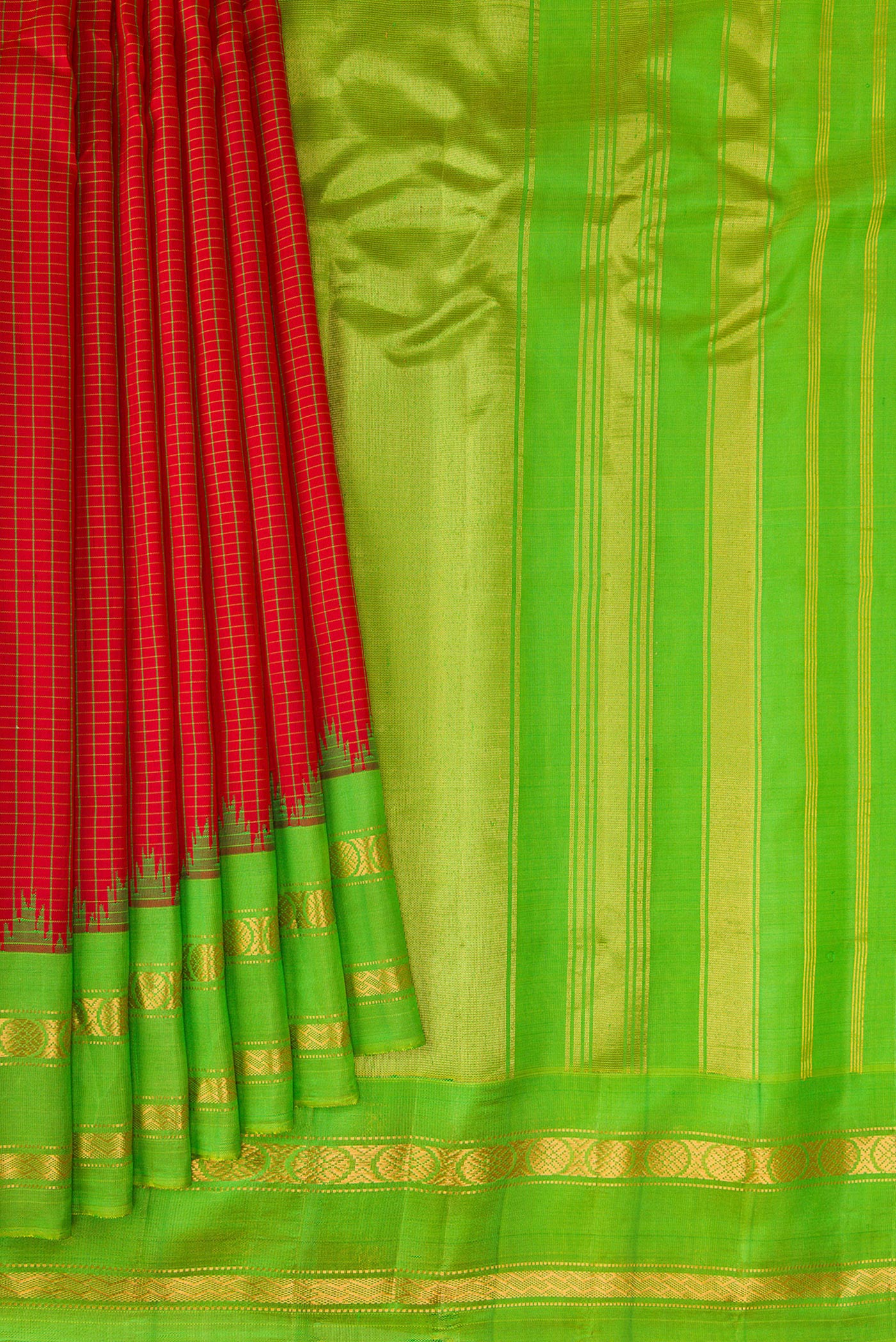 Pleats and pallu of Maroon Gadwal Silk Saree with Checked design on the body and Zari Border. 