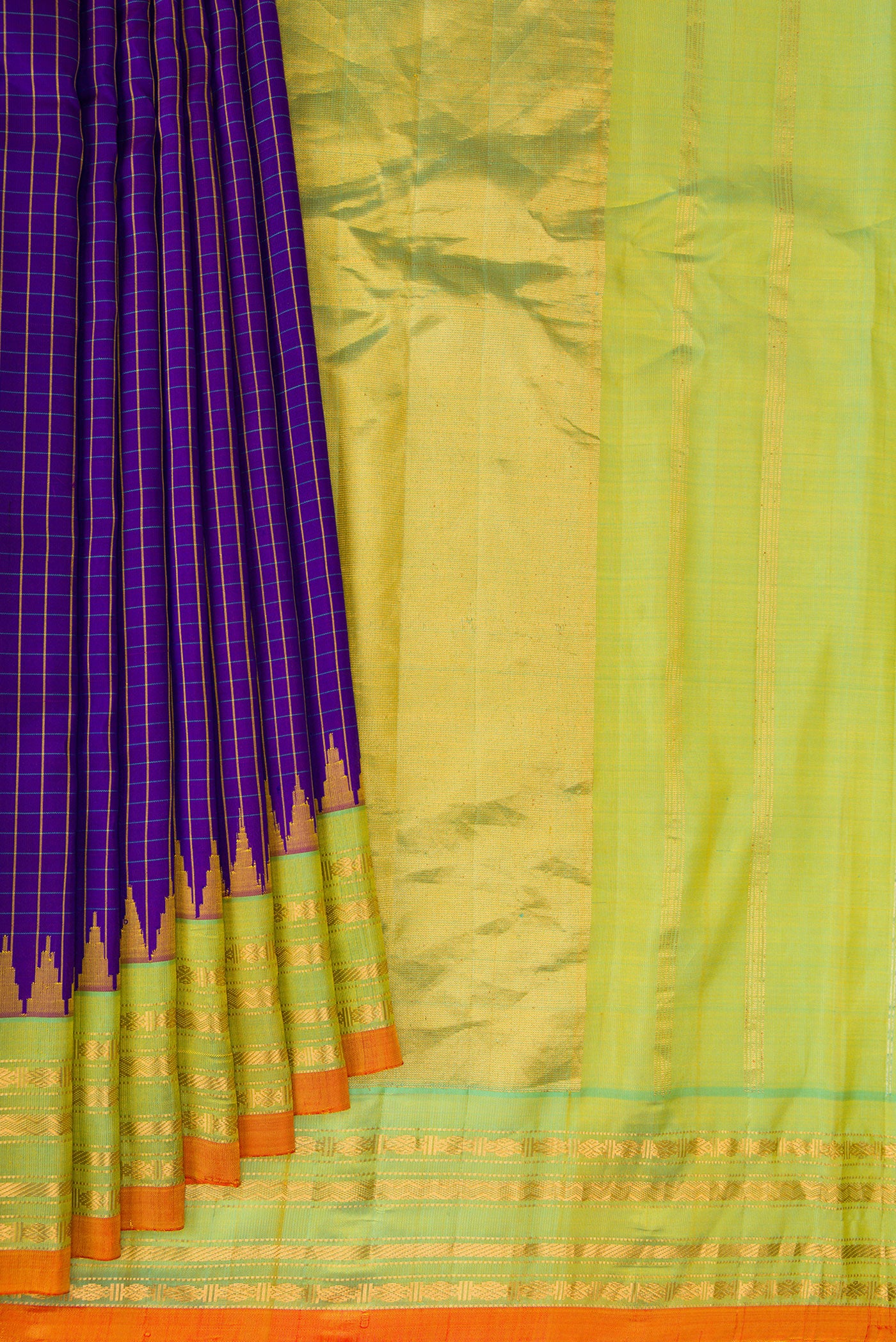 Pleats and pallu of Dark Blue Gadwal Silk Saree with Checked design on the body and Zari Border. 