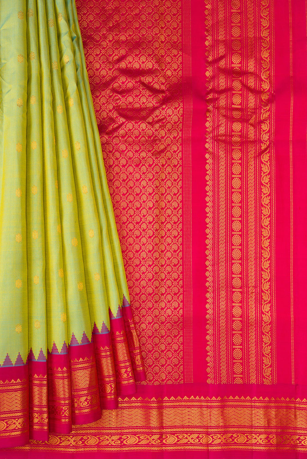 Pleats and pallu of Pista Green Gadwal Silk Saree with Zari Butta on the body and Zari Border. 