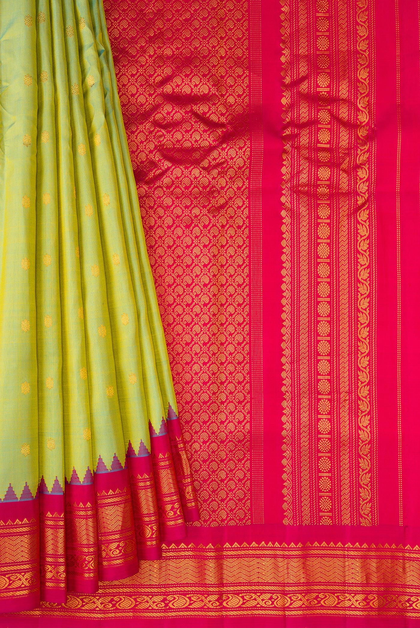 Pleats and pallu of Pista Green Gadwal Silk Saree with Zari Butta on the body and Zari Border. 