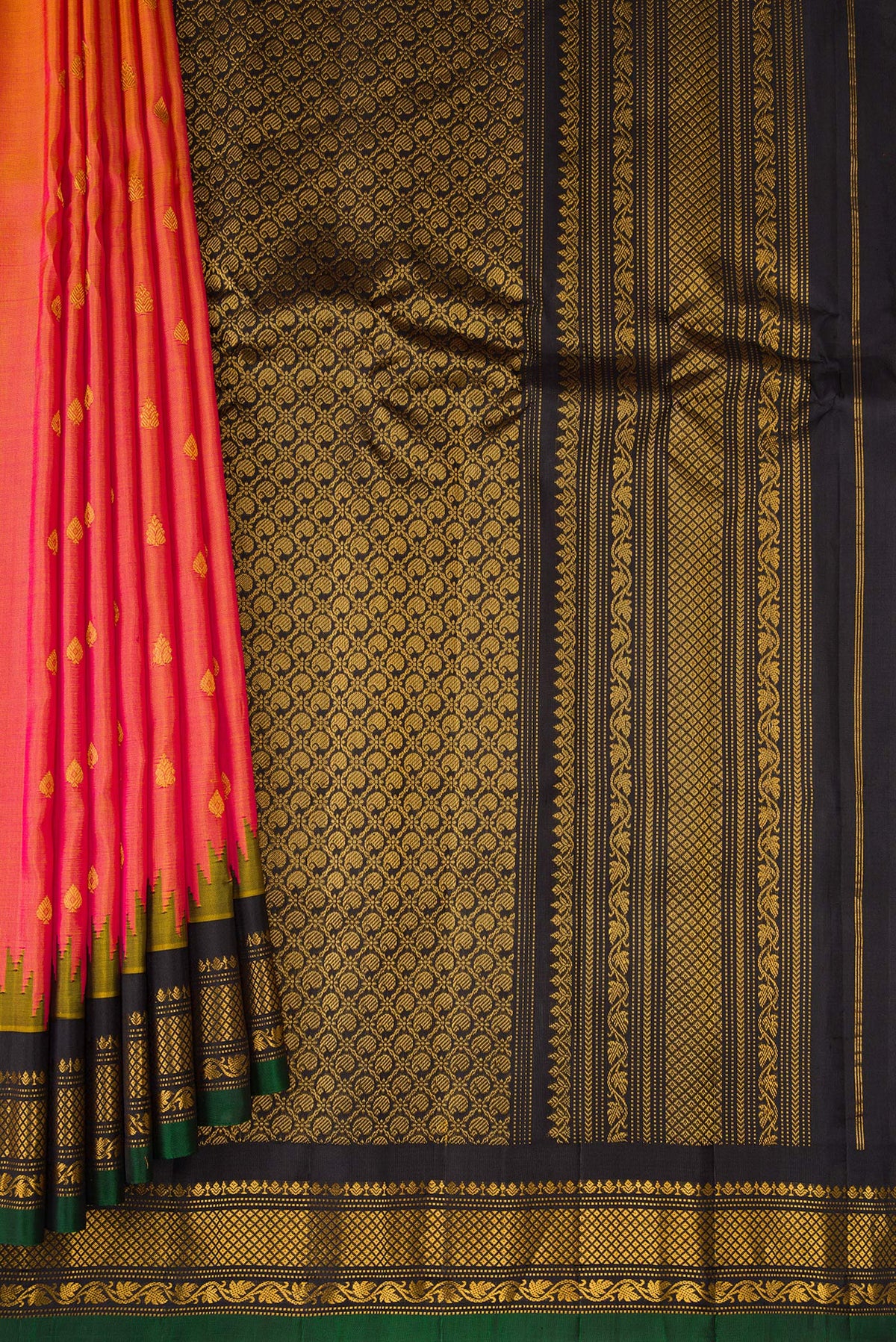 Pleats and pallu of Pinkish Yellow Dual Tone Gadwal Silk Saree with Zari Butta on the body and Fancy Border. 