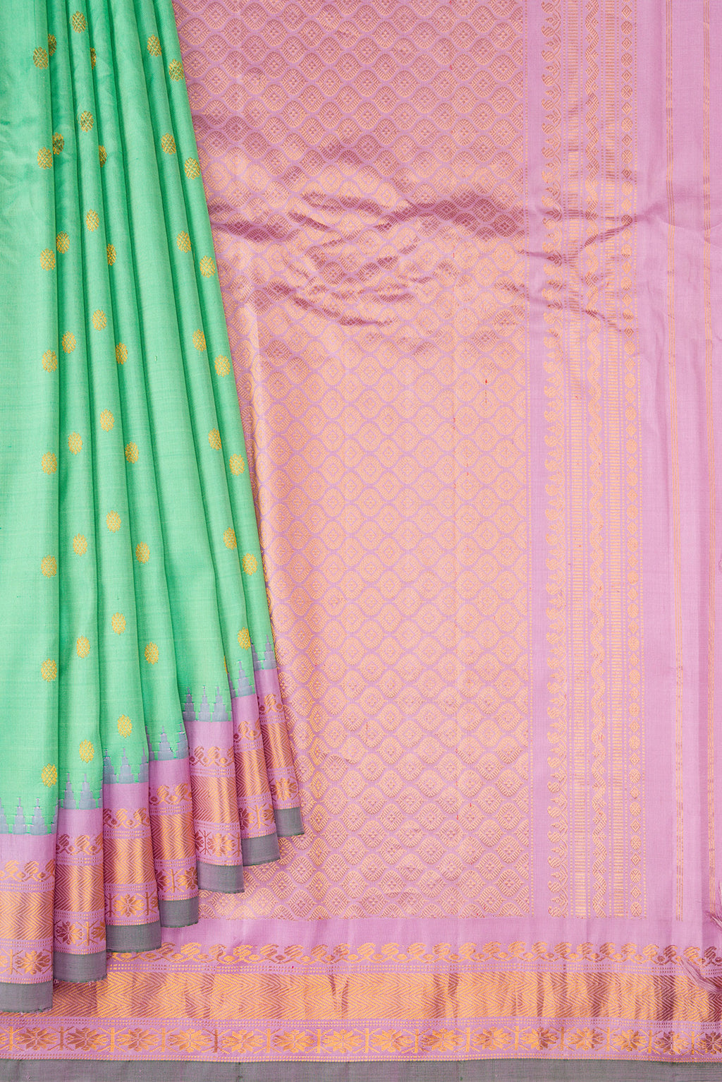 Pleats and pallu of Sea Green Gadwal Silk Saree with Zari Butta on the body and Zari Border. 