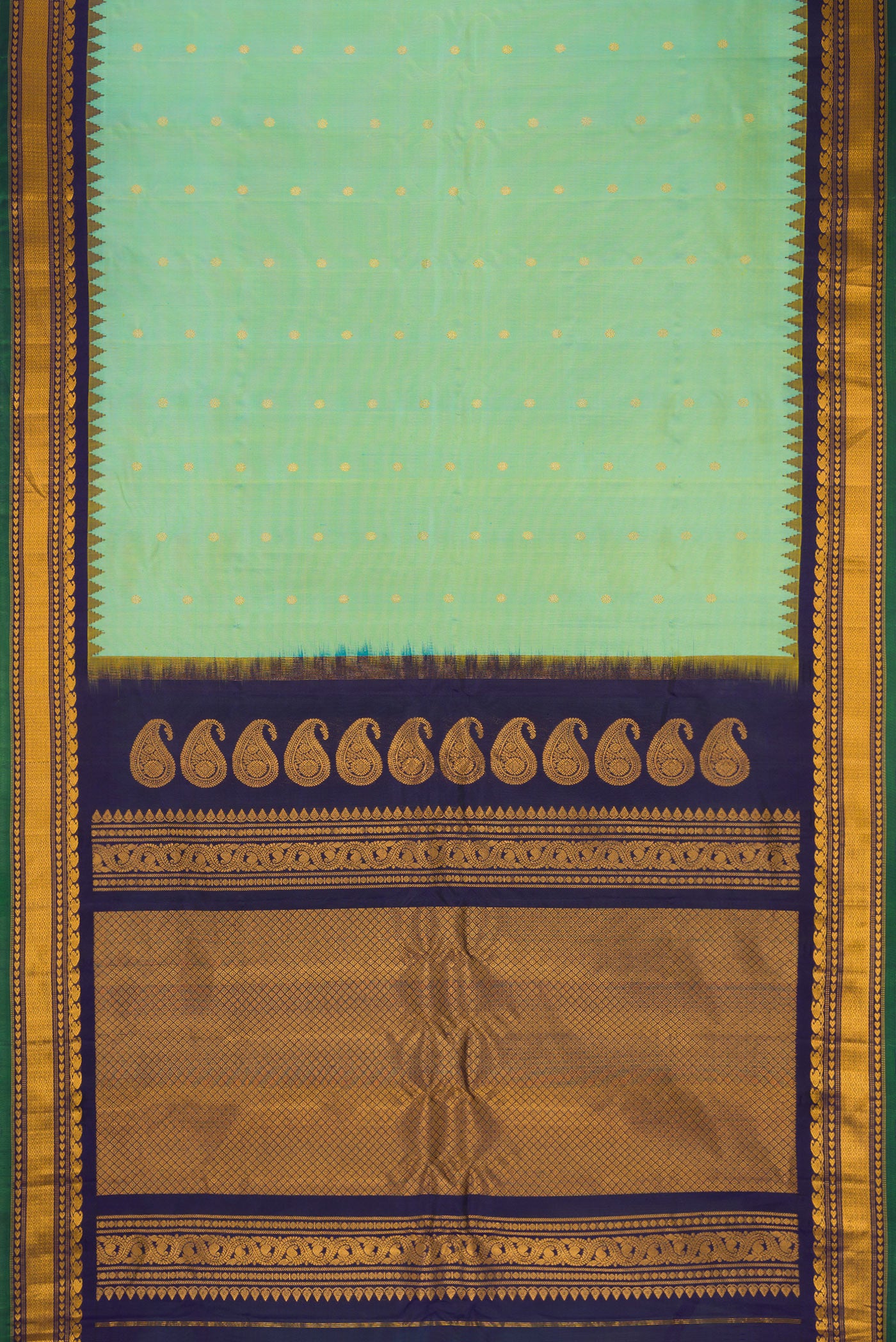 Flat view of Pista Green Gadwal Silk Saree with Zari Butta on the body and Temple Border. 