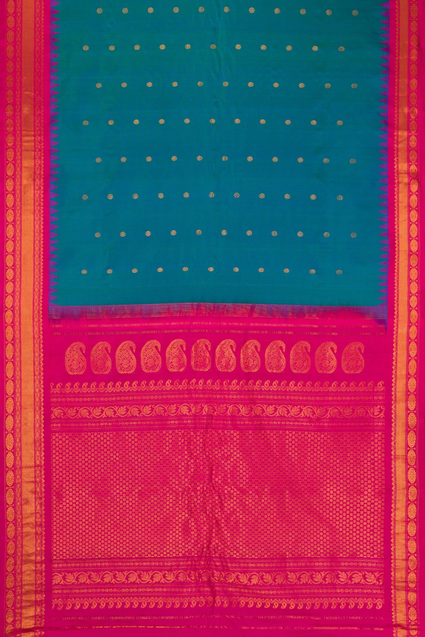 Flat view of Peacock Blue Gadwal Silk Saree with Zari Butta on the body and Zari Border. 