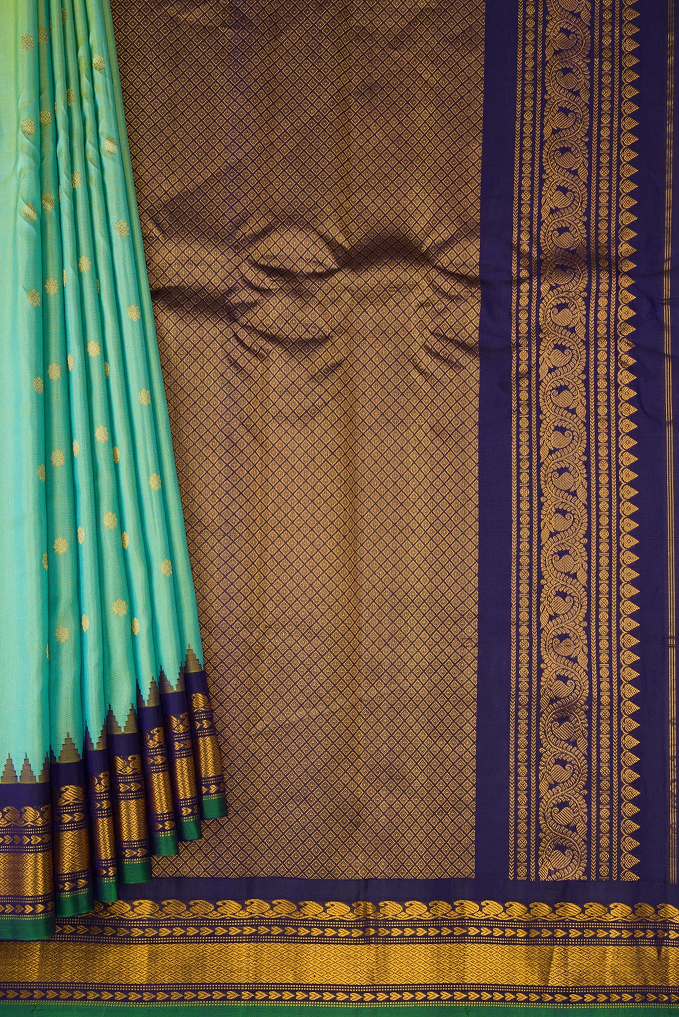 Pleats and pallu of Light Green Dual Tone Gadwal Silk Saree with Zari Butta on the body and Zari Border. 
