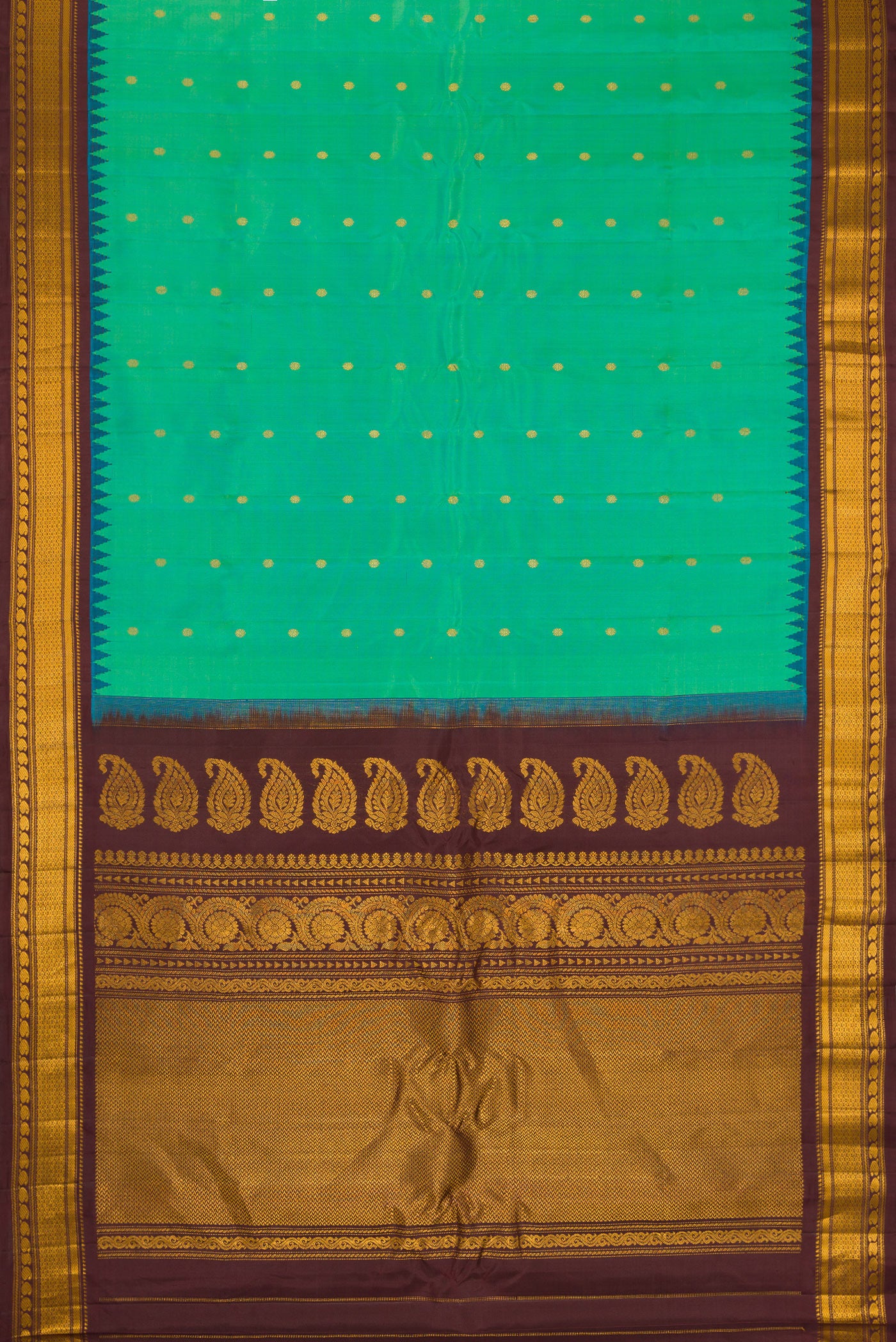 Flat view of Sea Green Gadwal Silk Saree with Zari Butta on the body and Zari Border. 