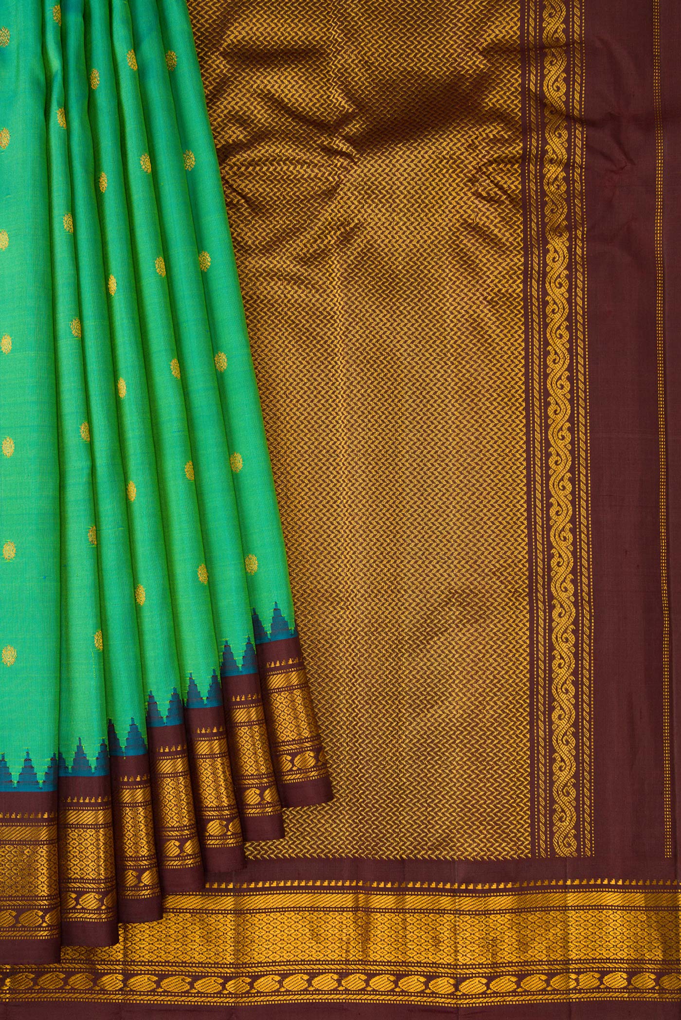 Pleats and pallu of Sea Green Gadwal Silk Saree with Zari Butta on the body and Zari Border. 