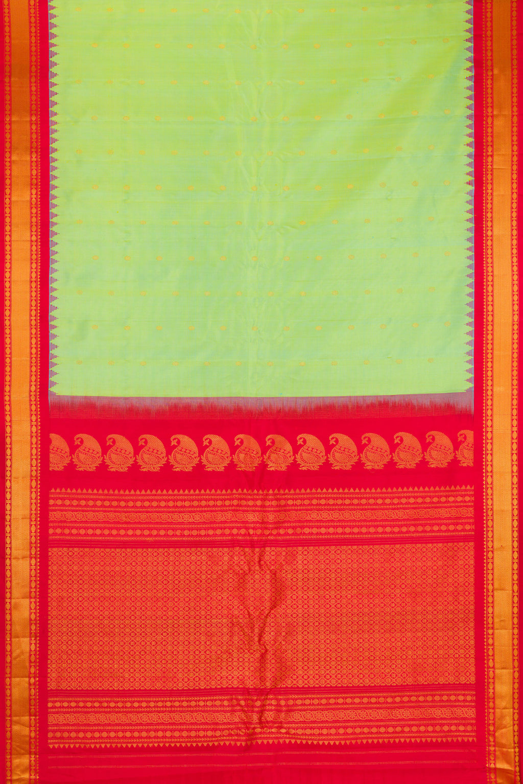 Flat view of Pista Green Gadwal Silk Saree with Zari Butta on the body and Zari Border. 