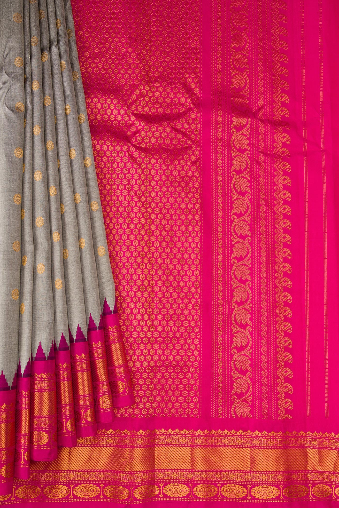Pleats and pallu of Grey Gadwal Silk Saree with Zari Butta on the body and Temple Border. 
