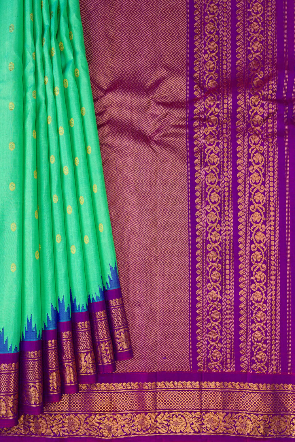 Pleats and pallu of Sea Green Gadwal Silk Saree with Zari Butta on the body and Zari Border. 