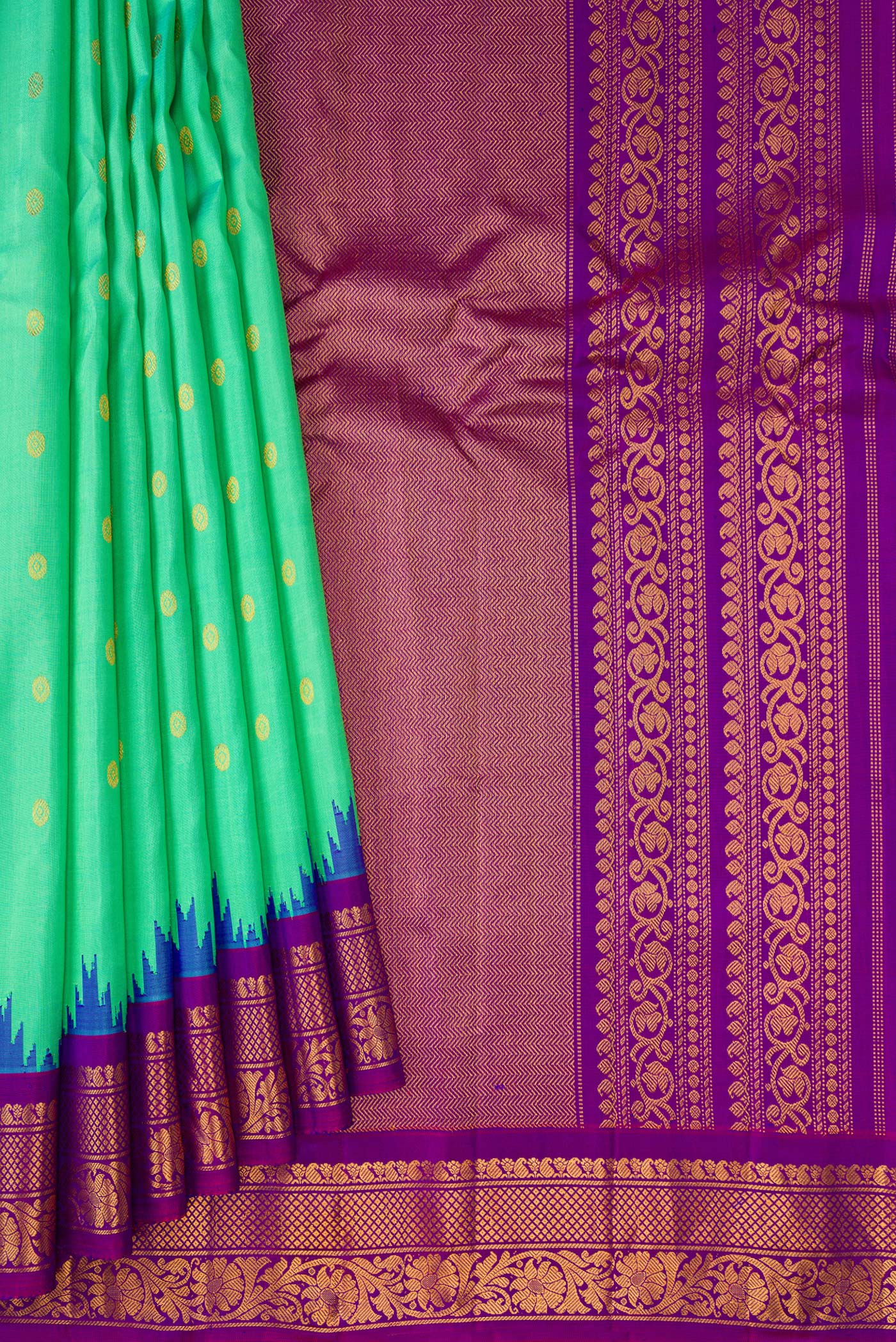 Pleats and pallu of Sea Green Gadwal Silk Saree with Zari Butta on the body and Zari Border. 