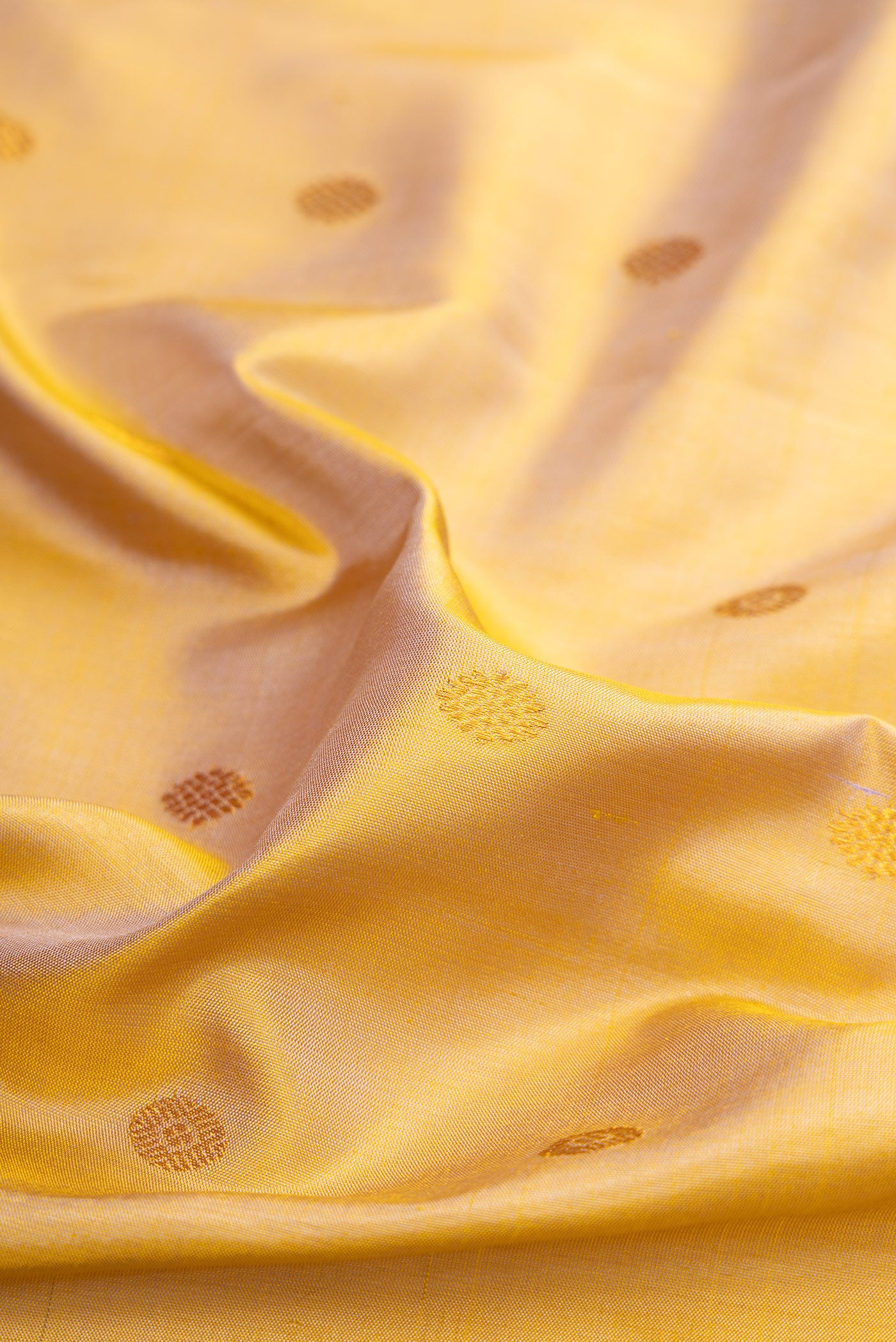 Close up of Sandal Dual Tone Gadwal Silk Saree with Checked design on the body and Zari Border.  displaying folds